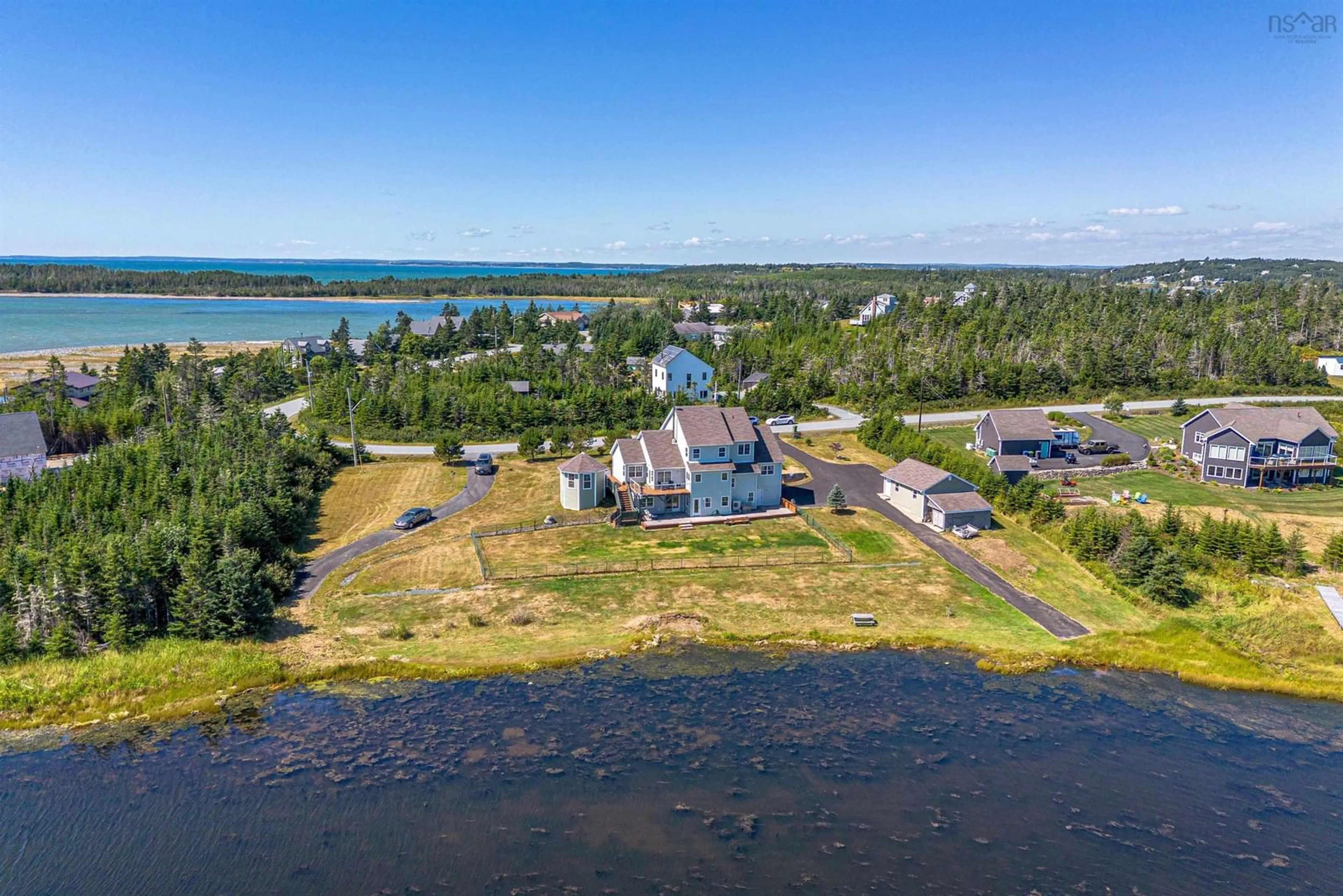 A pic from outside/outdoor area/front of a property/back of a property/a pic from drone, water/lake/river/ocean view for 118 Spruce Crt, Three Fathom Harbour Nova Scotia B0J 2L0