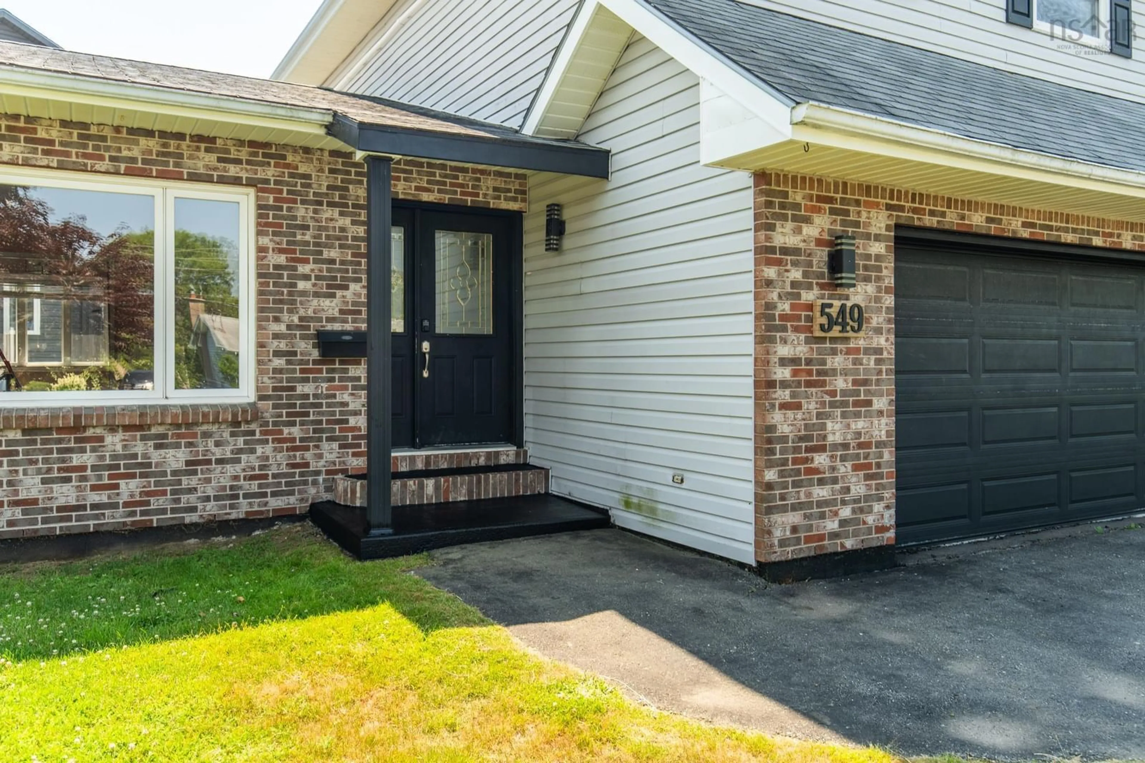 Home with brick exterior material, street for 549 Brunswick St, Yarmouth Nova Scotia B5A 4N3