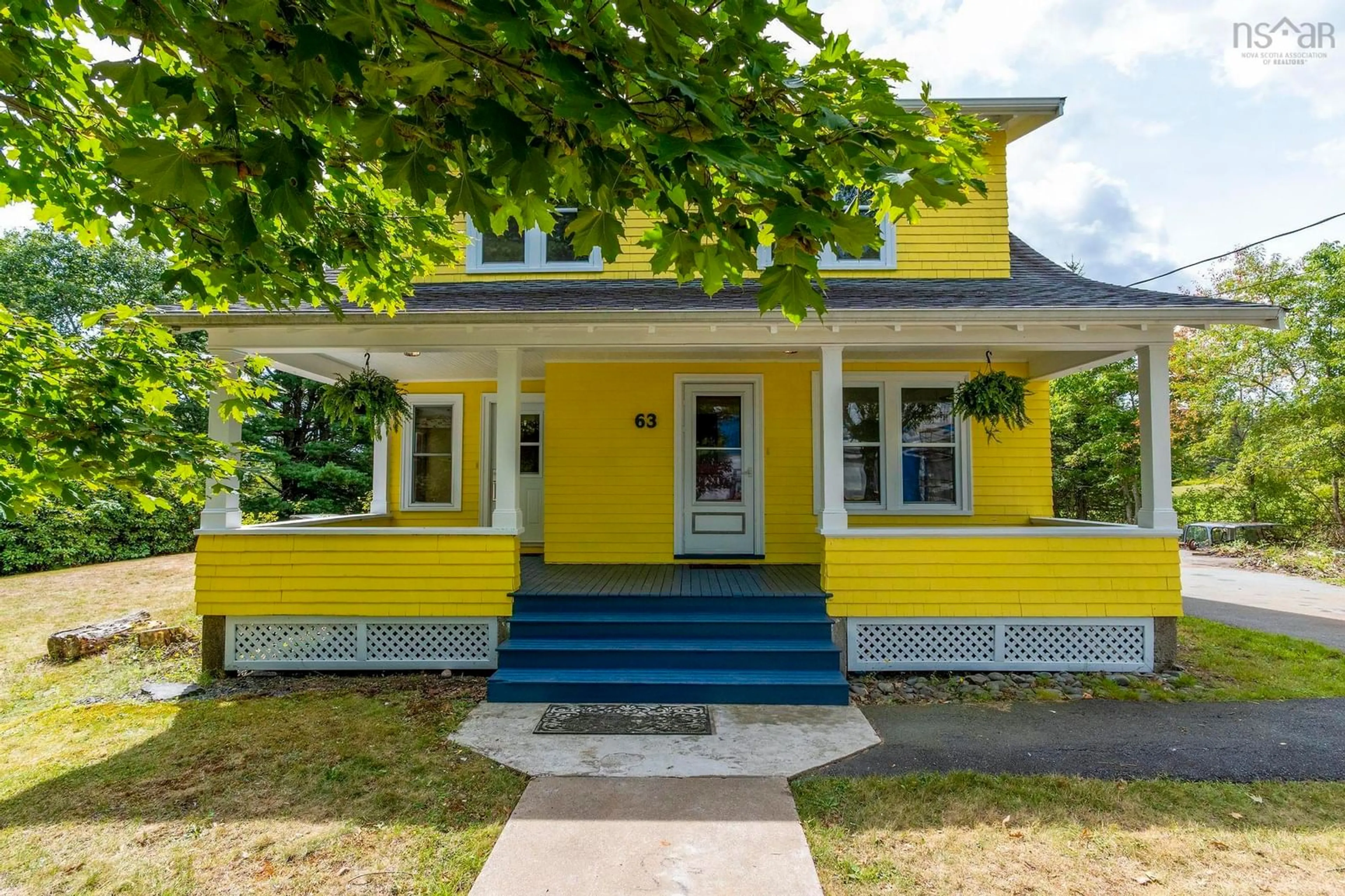 Home with vinyl exterior material, street for 63 Croft Rd, Chester Basin Nova Scotia B0J 1K0