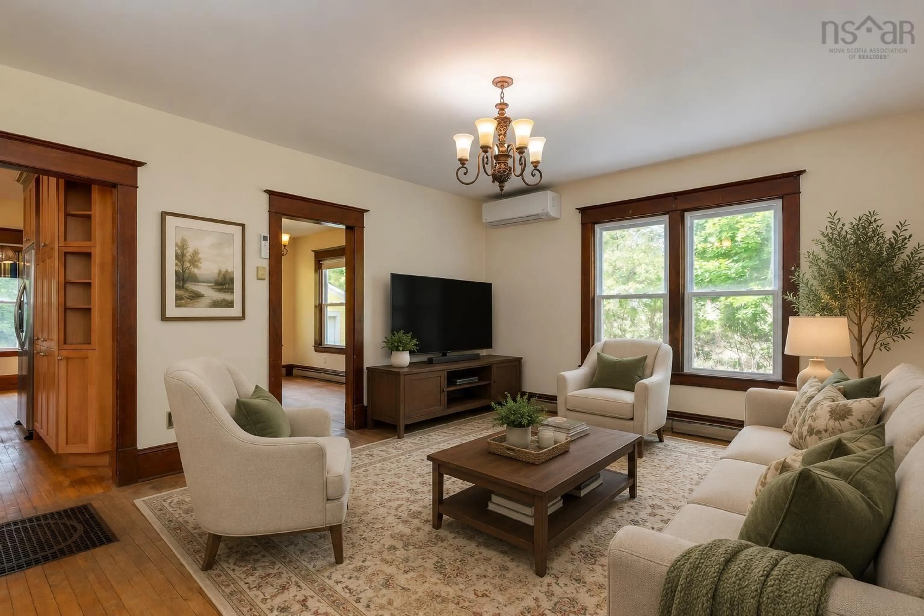 Living room with furniture, wood/laminate floor for 63 Croft Rd, Chester Basin Nova Scotia B0J 1K0