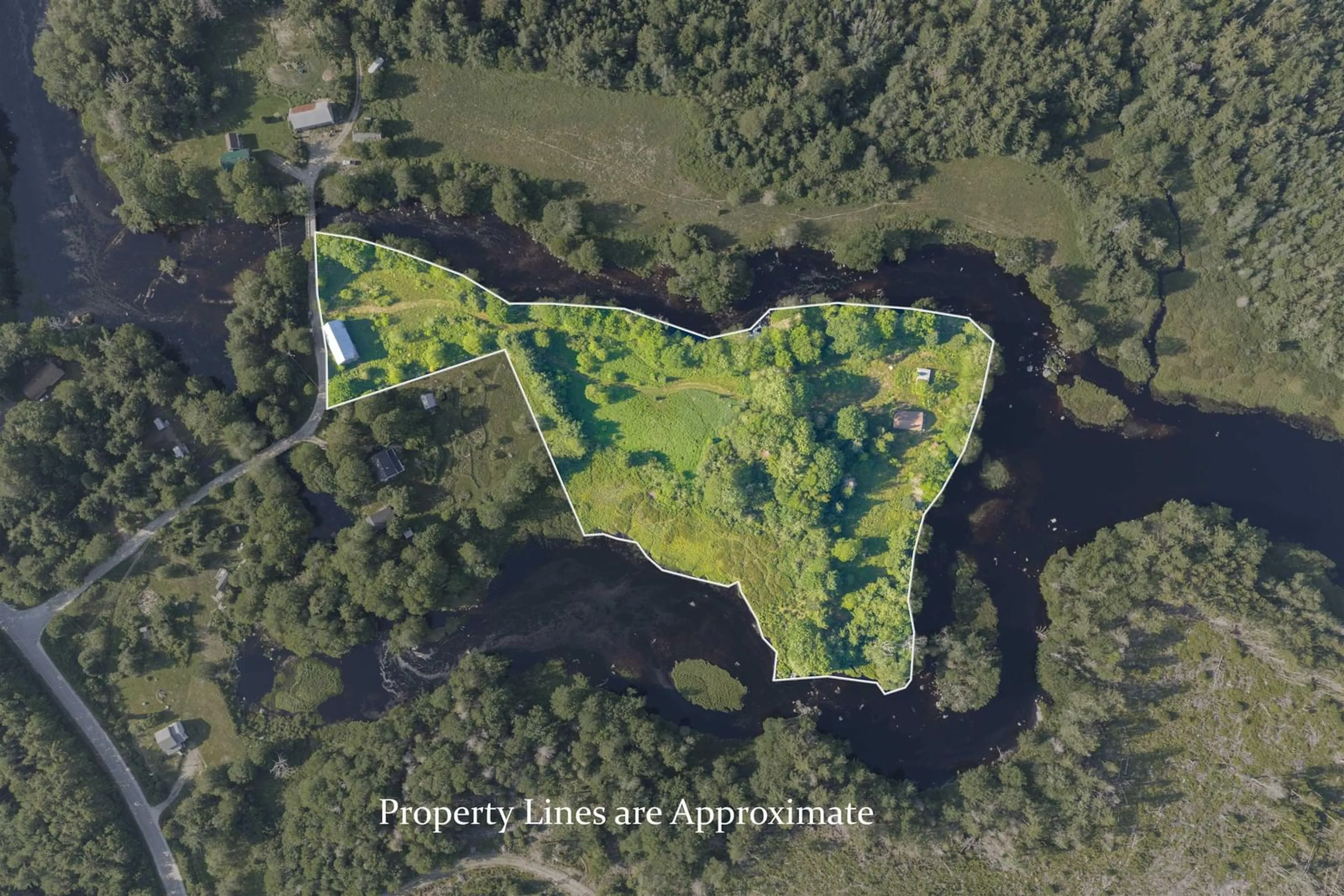 A pic from outside/outdoor area/front of a property/back of a property/a pic from drone, water/lake/river/ocean view for 40 Mcgillis Island, Middle Ohio Nova Scotia B0T 1W0