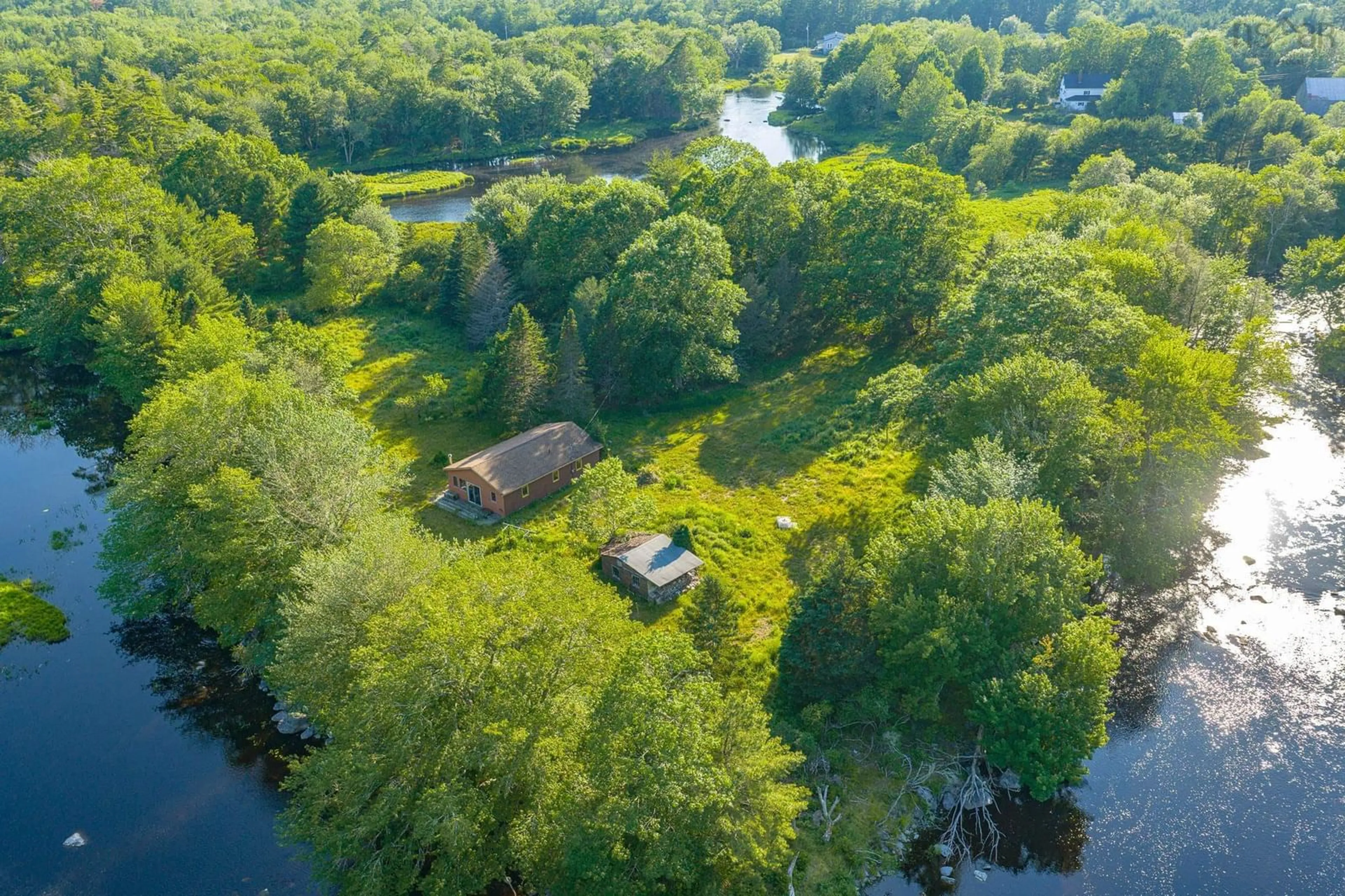 A pic from outside/outdoor area/front of a property/back of a property/a pic from drone, water/lake/river/ocean view for 40 Mcgillis Island, Middle Ohio Nova Scotia B0T 1W0