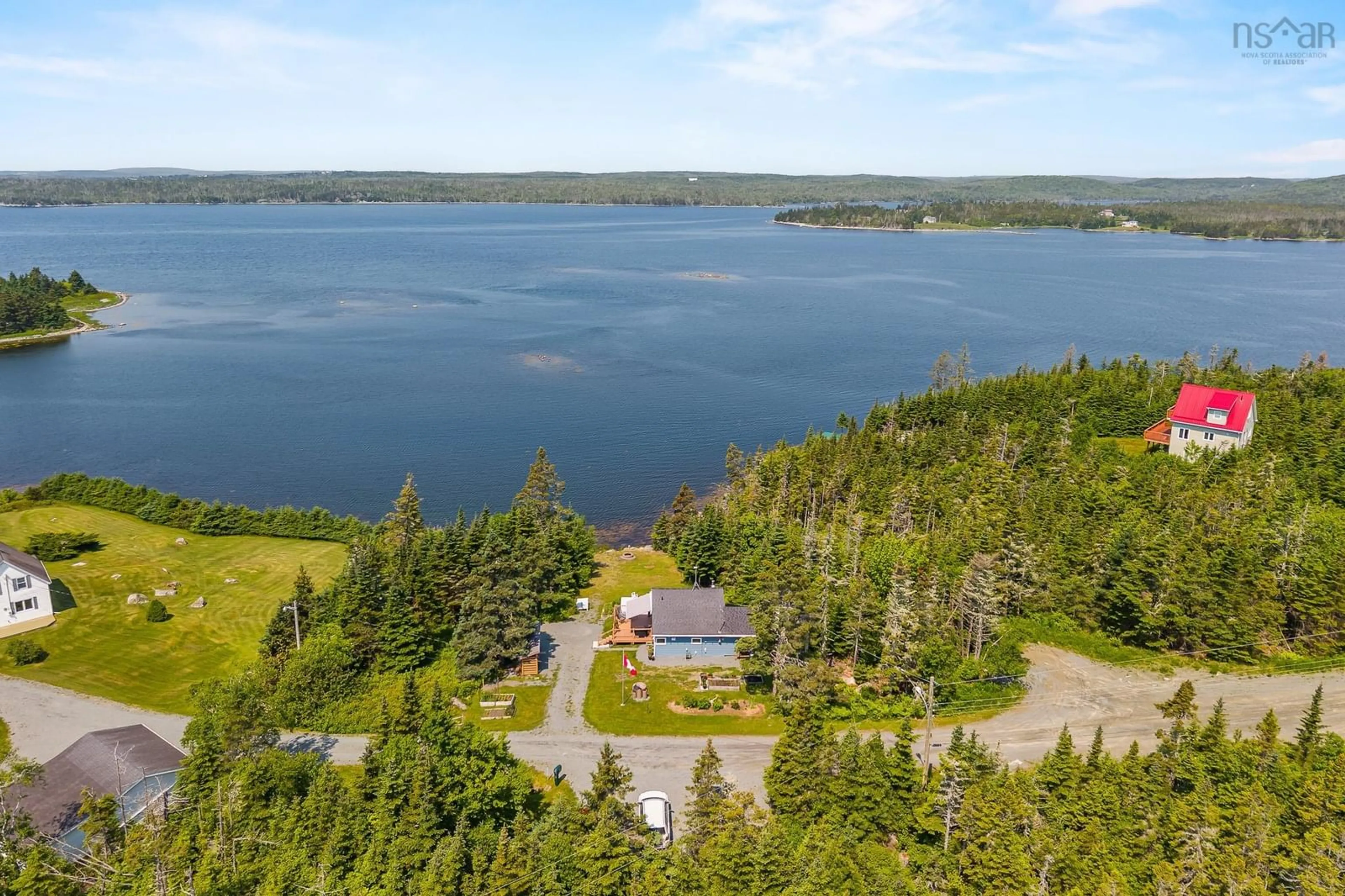A pic from outside/outdoor area/front of a property/back of a property/a pic from drone, water/lake/river/ocean view for 120 Power Rd, Tangier Nova Scotia B0J 3H0