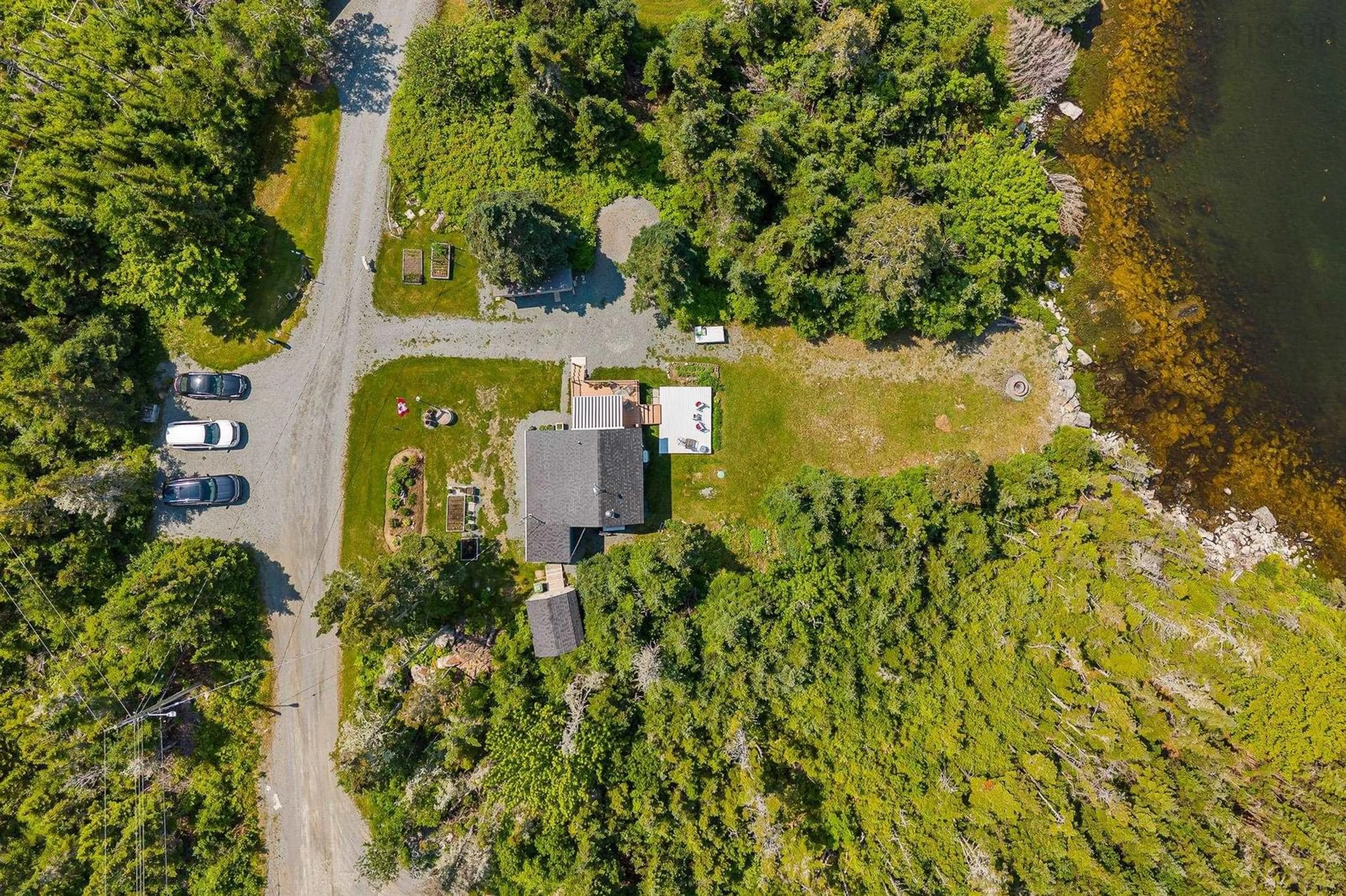 A pic from outside/outdoor area/front of a property/back of a property/a pic from drone, street for 120 Power Rd, Tangier Nova Scotia B0J 3H0