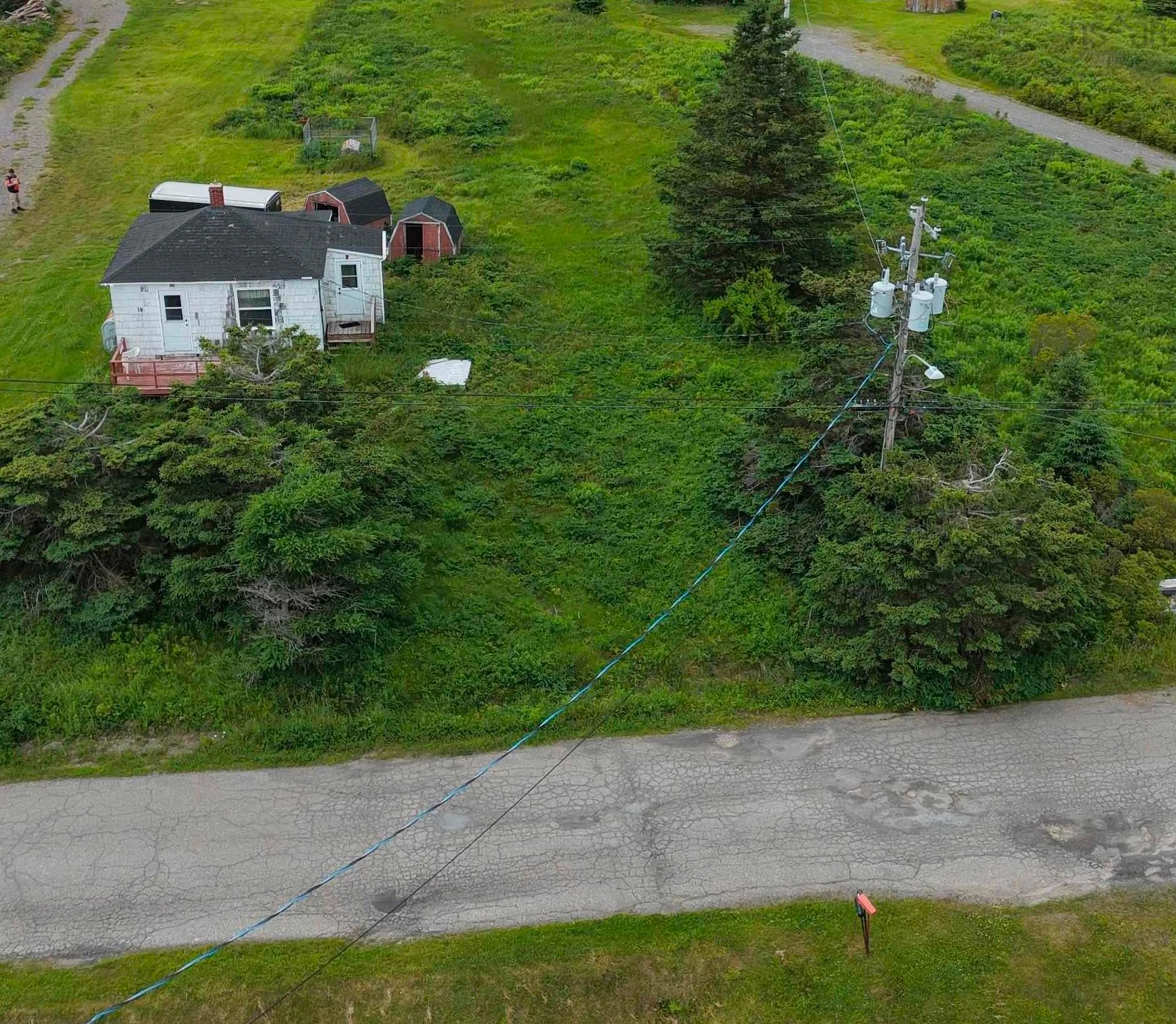 A pic from outside/outdoor area/front of a property/back of a property/a pic from drone, street for 19 Obrien Rd, L'Ardoise Nova Scotia B0E 1S0