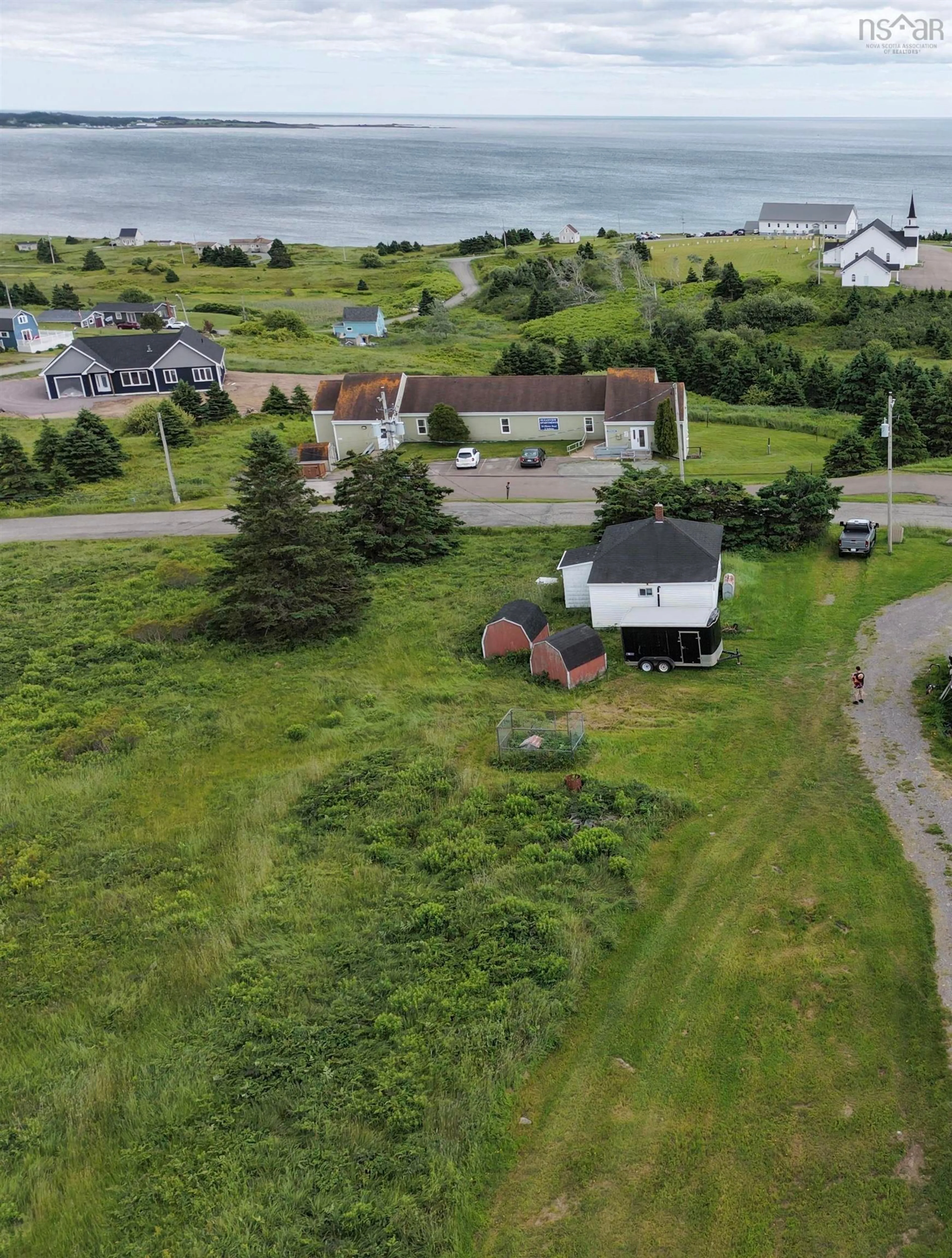 A pic from outside/outdoor area/front of a property/back of a property/a pic from drone, street for 19 Obrien Rd, L'Ardoise Nova Scotia B0E 1S0