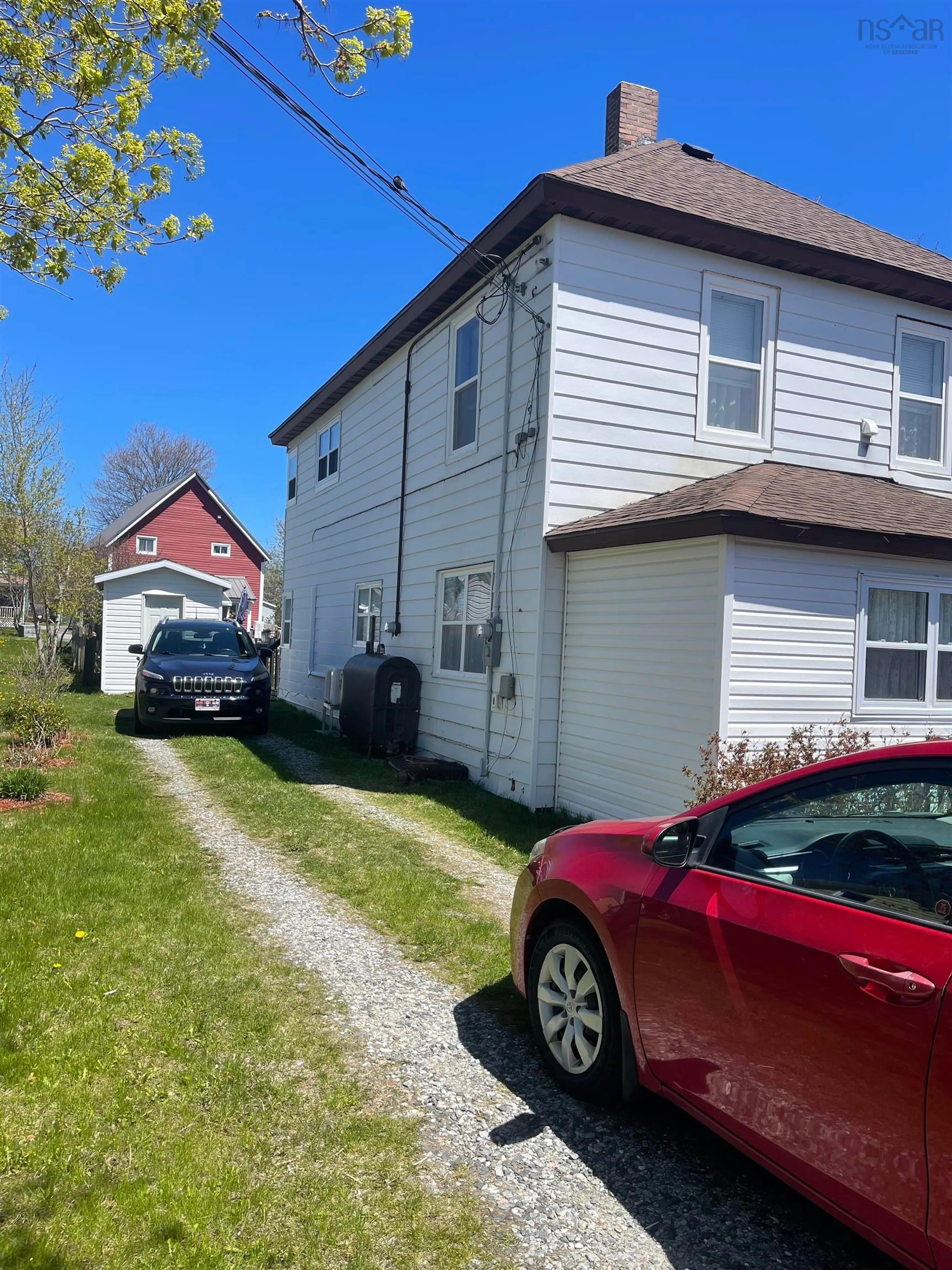 A pic from outside/outdoor area/front of a property/back of a property/a pic from drone, street for 530 Main St, Sydney Mines Nova Scotia B1V 2K6