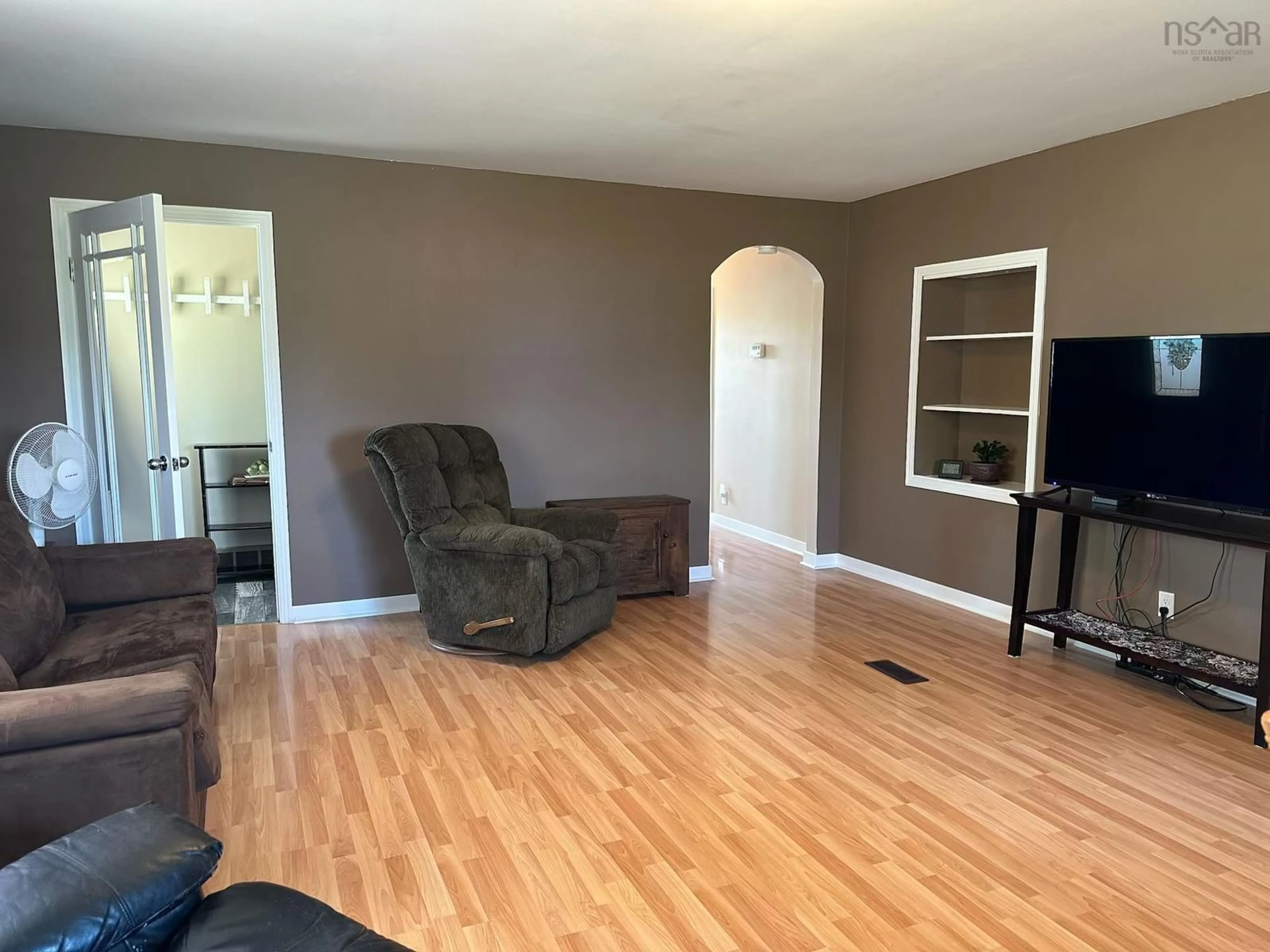 Living room with furniture, wood/laminate floor for 2515 Highway 2, Shubenacadie Nova Scotia B0N 2H0