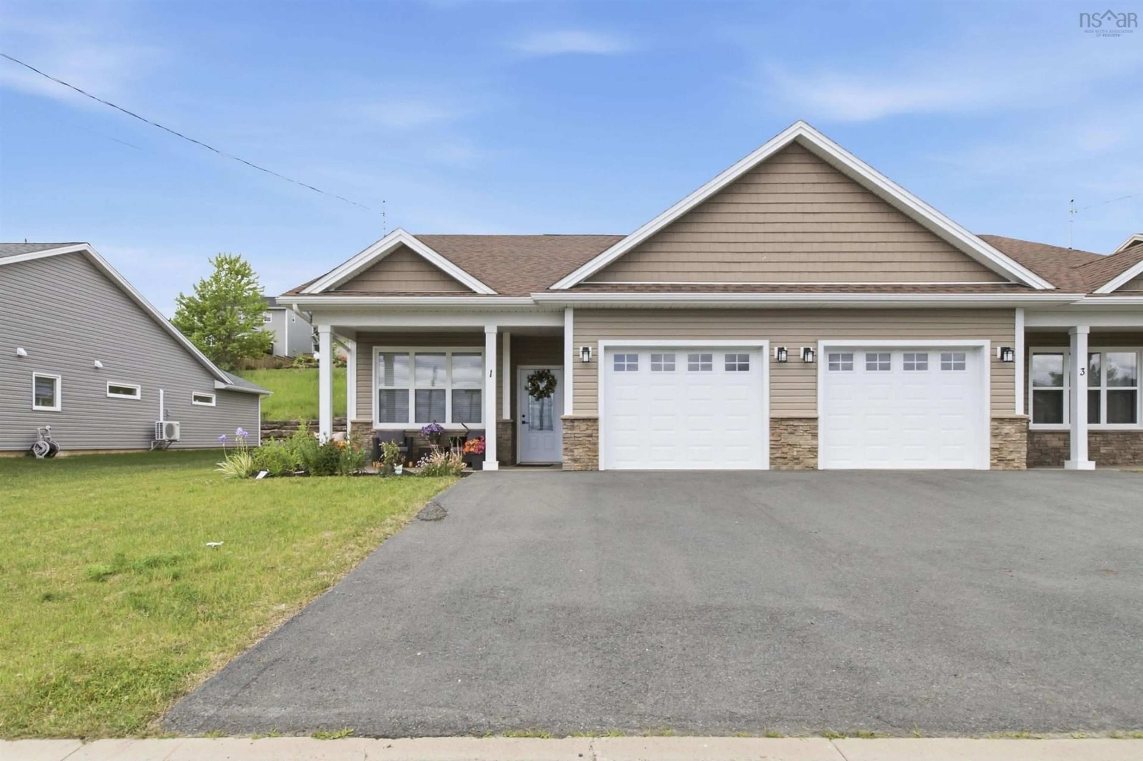 Home with vinyl exterior material, street for 1 Thistle Street, Falmouth Nova Scotia B0P 1L0