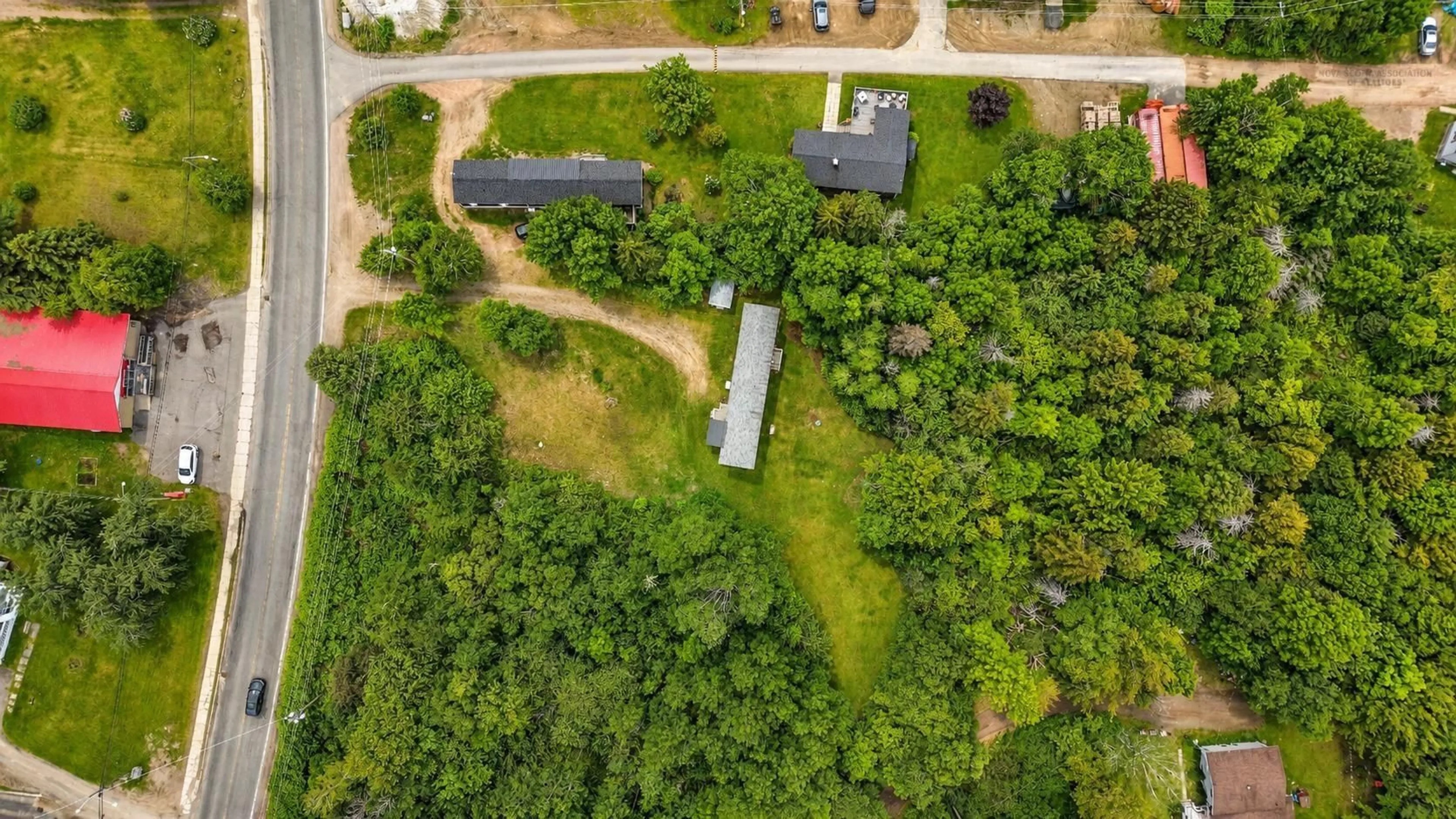A pic from outside/outdoor area/front of a property/back of a property/a pic from drone, forest/trees view for 37790 Cabot Trail, Ingonish Beach Nova Scotia B0C 1L0