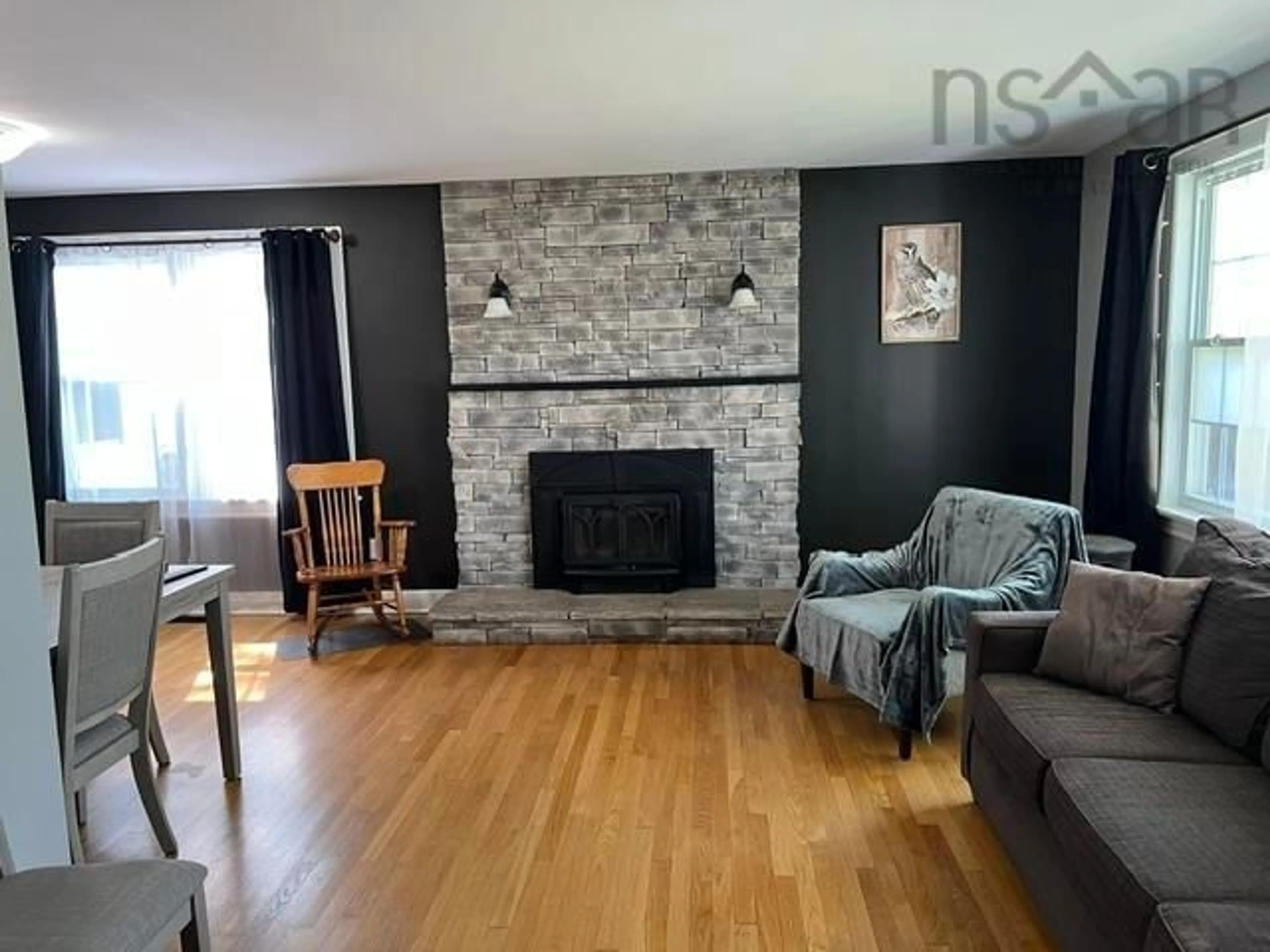 Living room with furniture, wood/laminate floor for 26 Crescent Dr, Truro Nova Scotia B2N 1N6