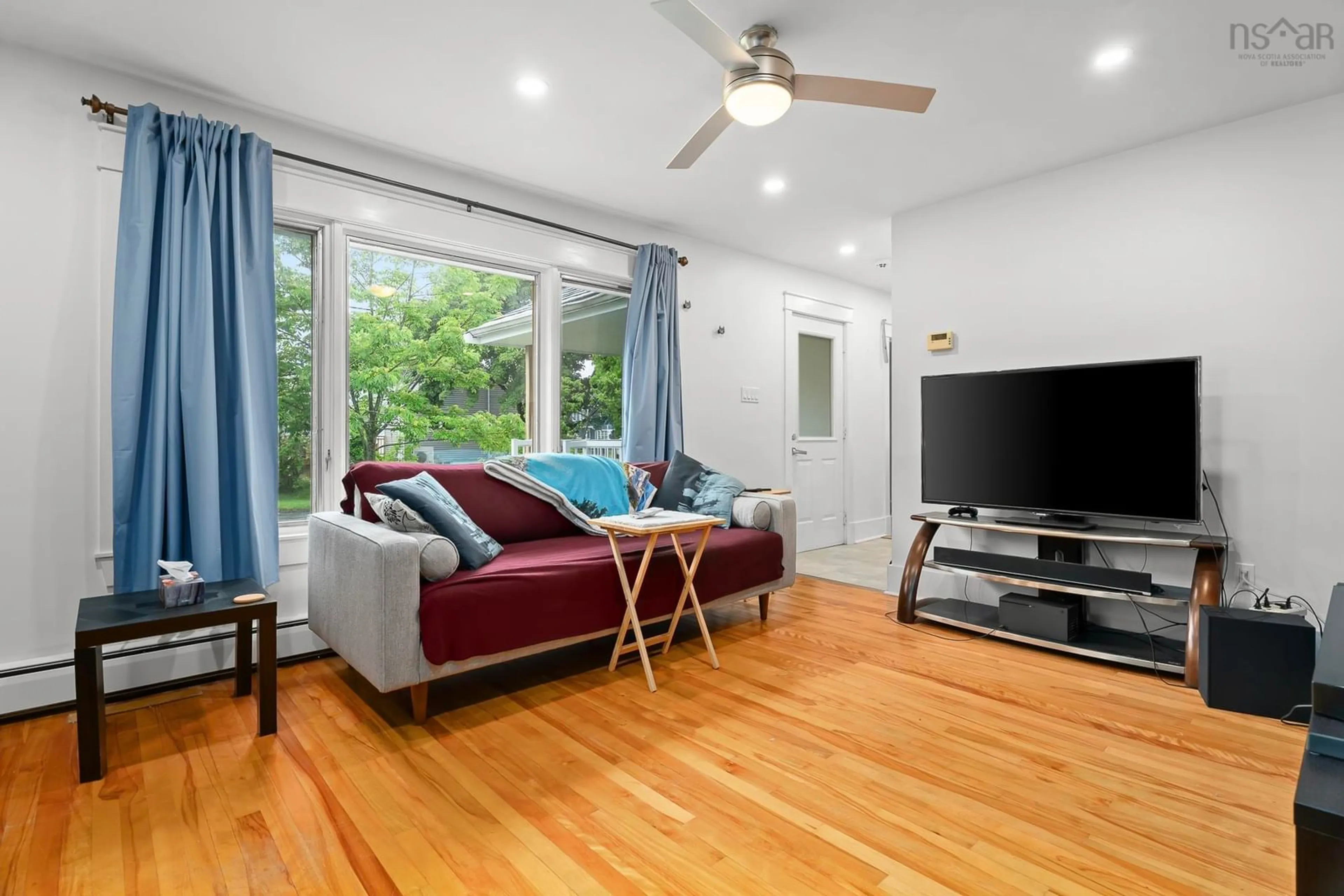 Living room with furniture, wood/laminate floor for 47 Frances St, Dartmouth Nova Scotia B3A 3H5