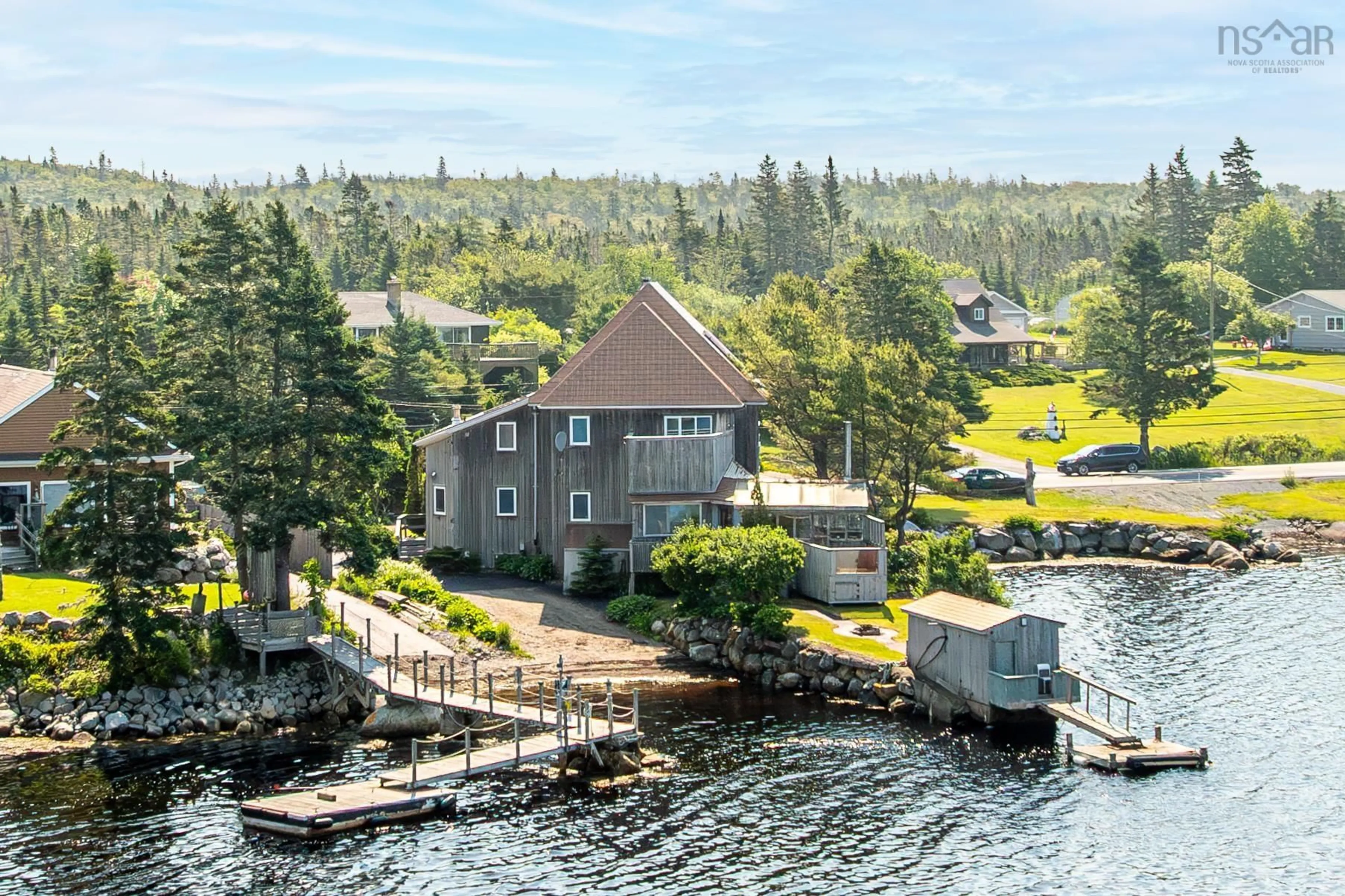 A pic from outside/outdoor area/front of a property/back of a property/a pic from drone, water/lake/river/ocean view for 3994 Prospect Rd, Shad Bay Nova Scotia B3T 2B9