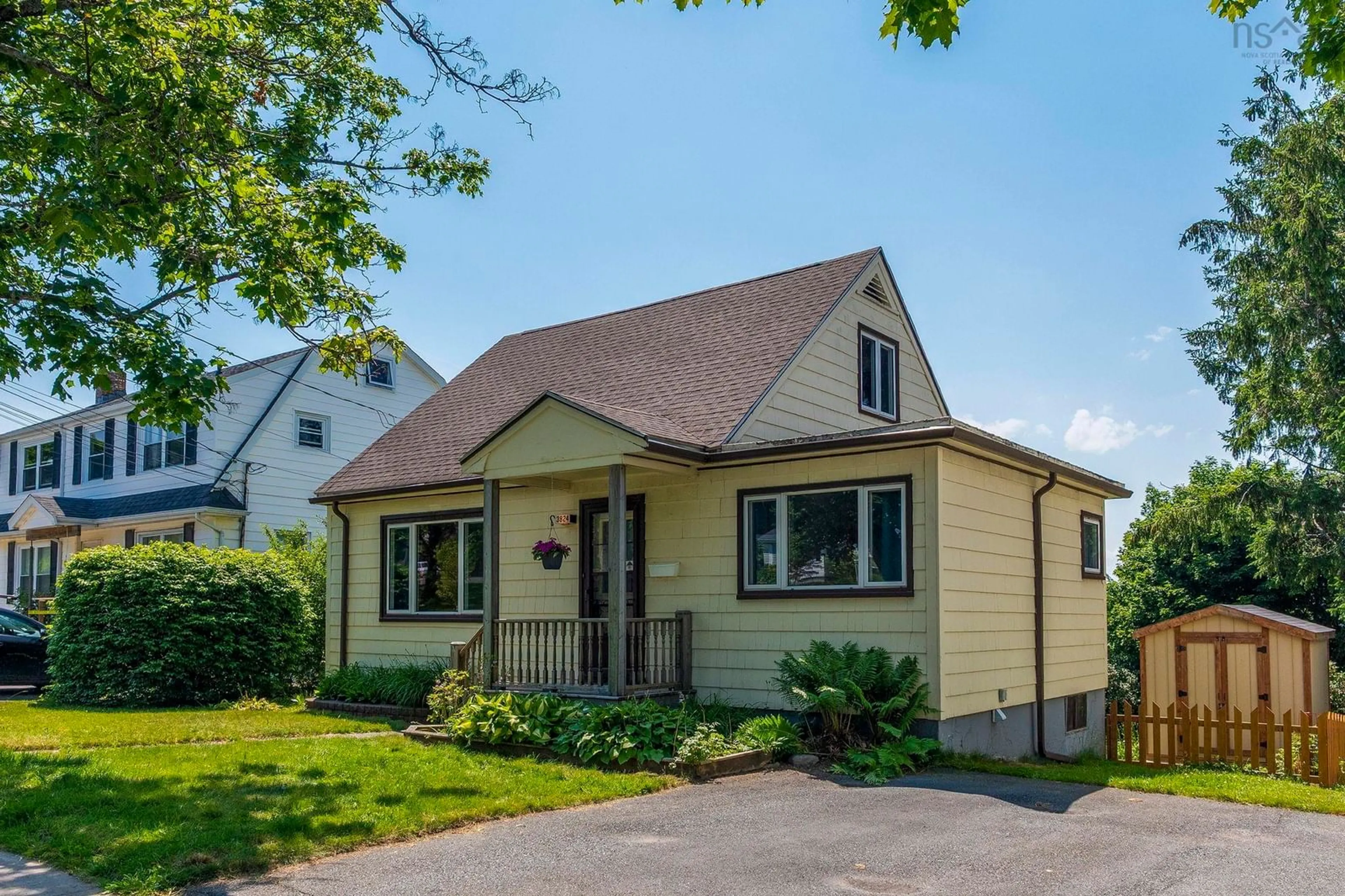 Home with vinyl exterior material, street for 3824 Basinview Drive Dr, Halifax Peninsula Nova Scotia B3K 4Z9