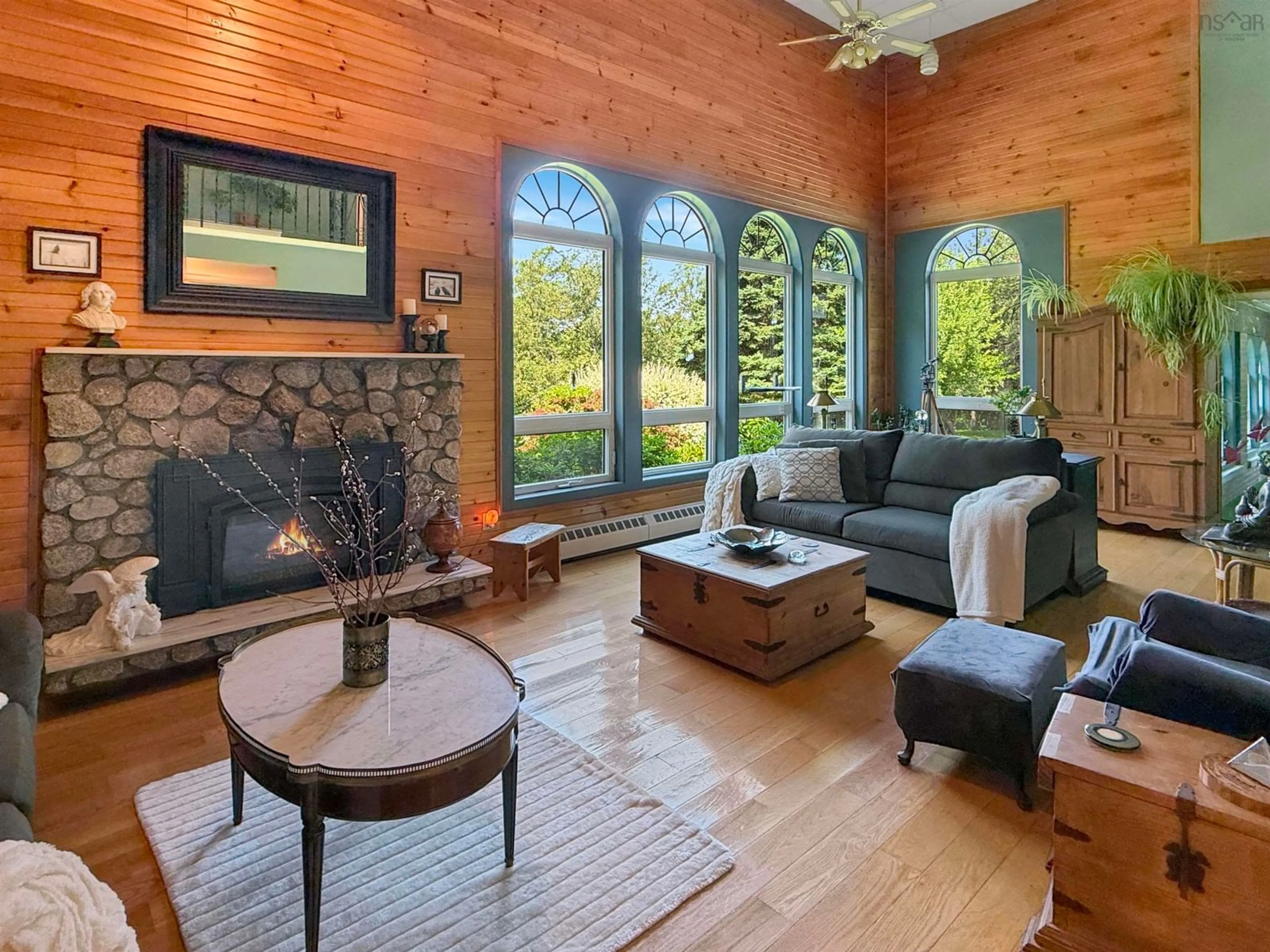 Living room with furniture, wood/laminate floor for 21 Munroes Lane, Plymouth Nova Scotia B2H 5C6