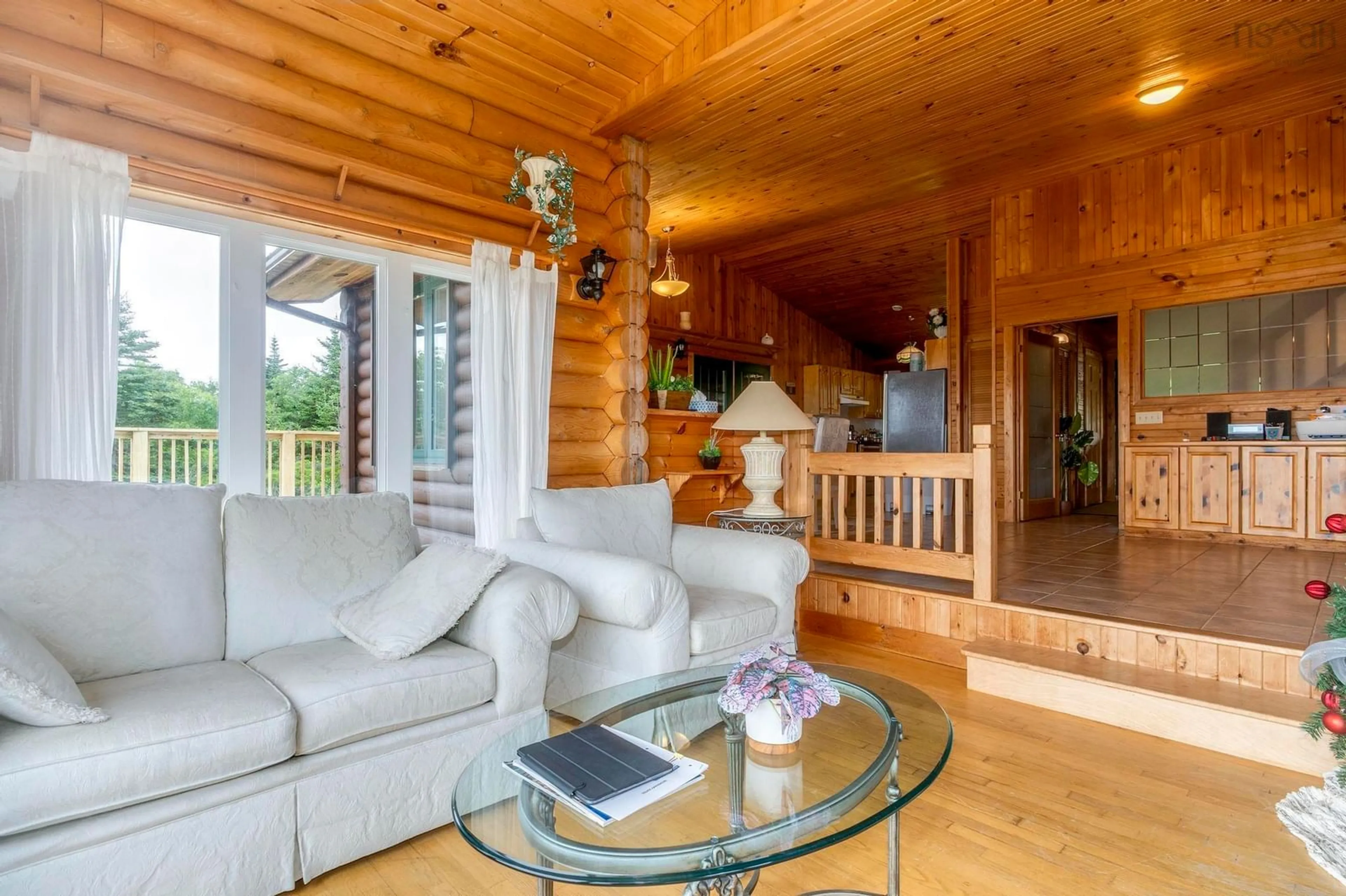 Living room with furniture, wood/laminate floor for 32 and 36 Mary Jollimore Rd, Terence Bay Nova Scotia B3T 1X8
