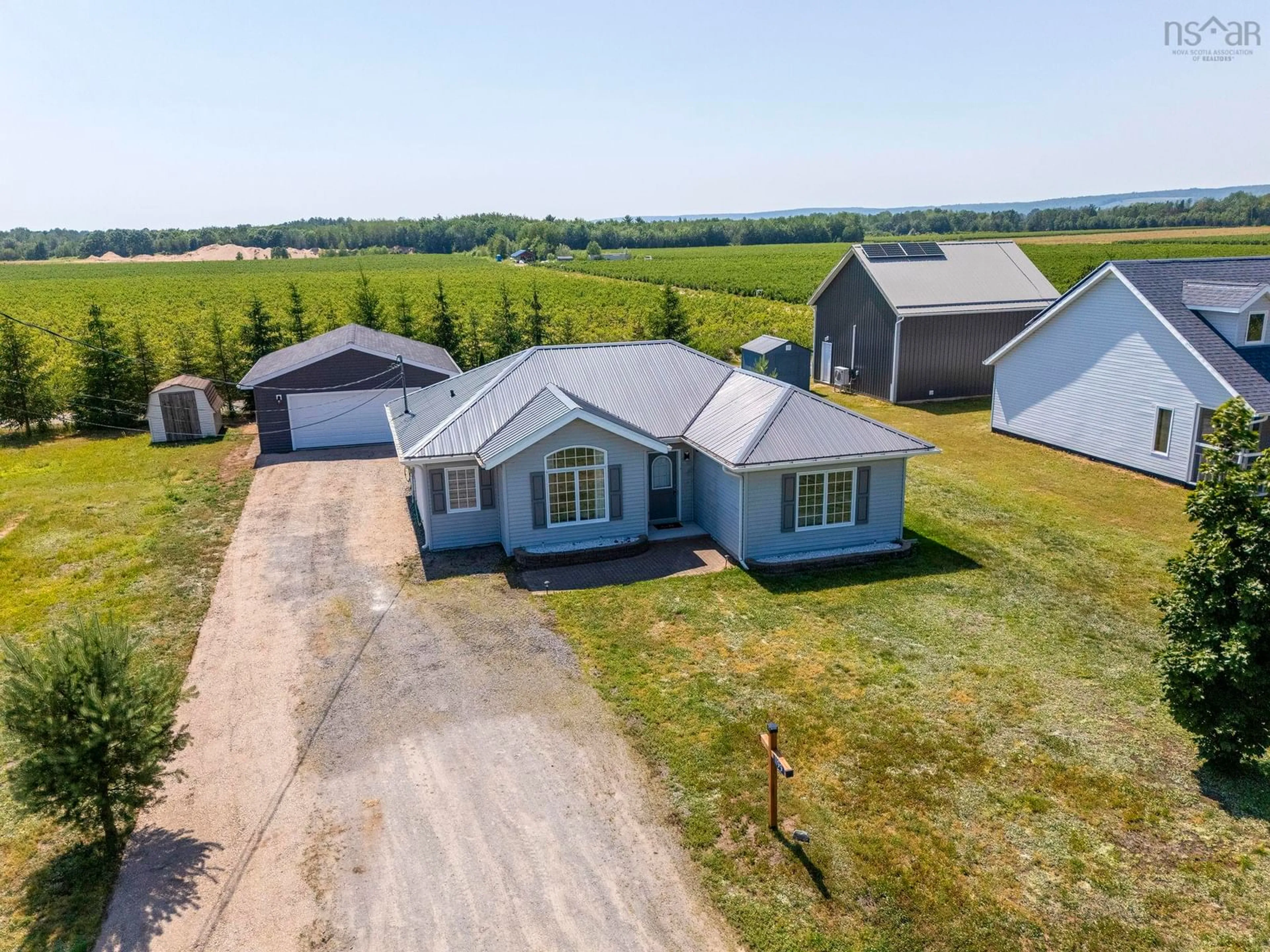 A pic from outside/outdoor area/front of a property/back of a property/a pic from drone, building for 1199 New Rd, Aylesford Nova Scotia B0P 1C0