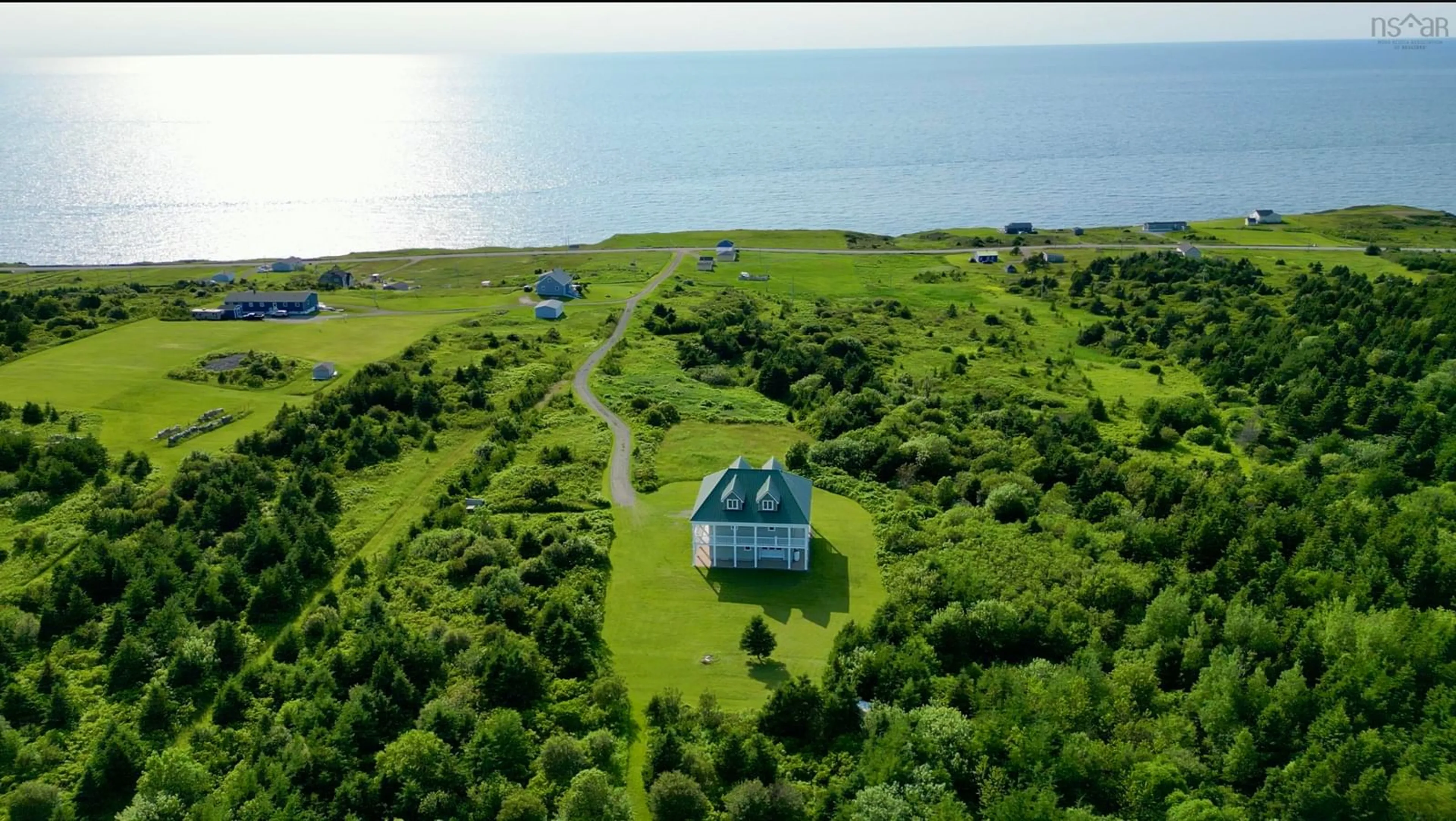 A pic from outside/outdoor area/front of a property/back of a property/a pic from drone, water/lake/river/ocean view for 81 Chemin Doucet-Aucoin   Lot 3 Rd, Cap Le Moine Nova Scotia B0E 3A0