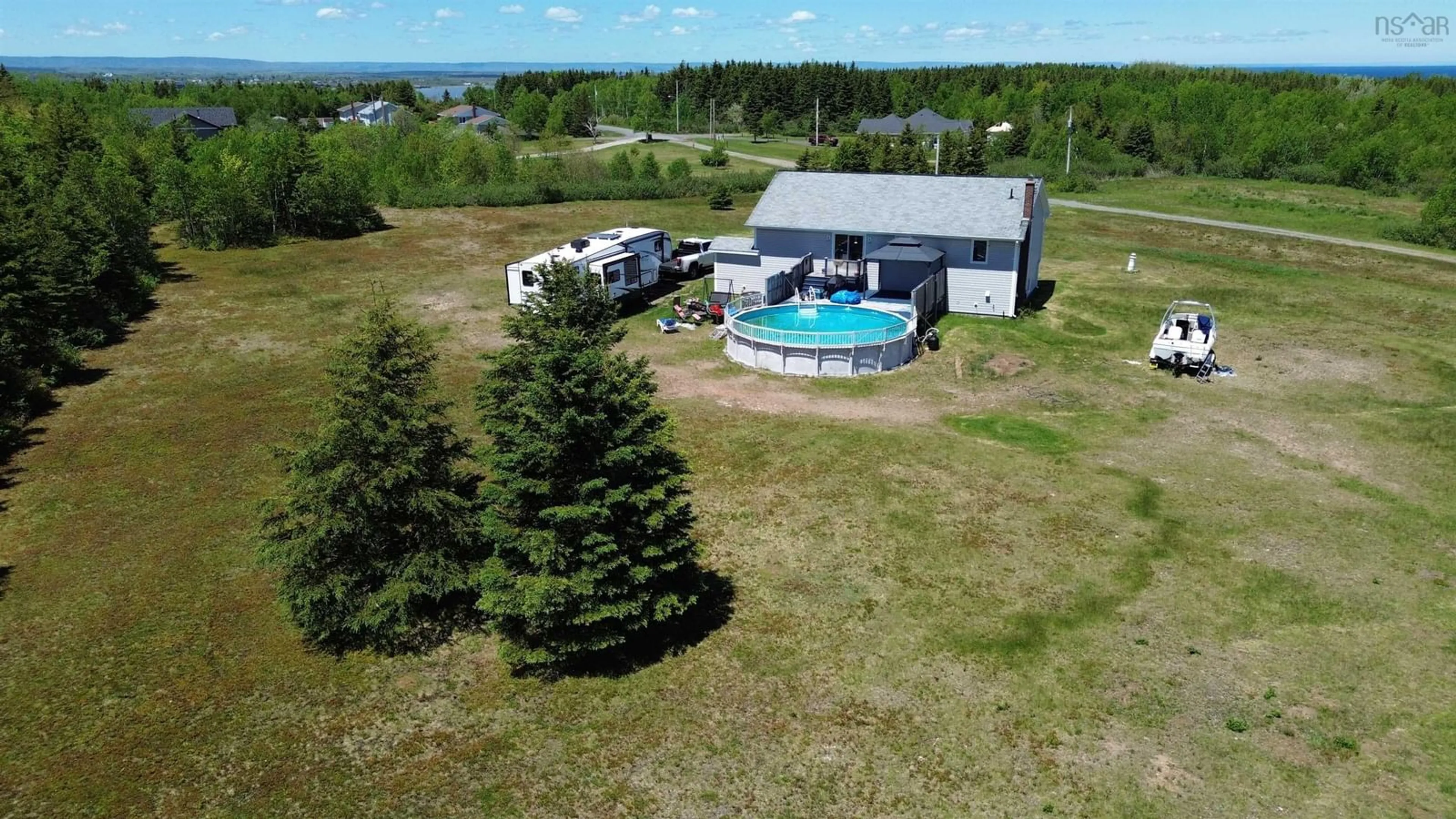 A pic from outside/outdoor area/front of a property/back of a property/a pic from drone, water/lake/river/ocean view for 176 Armada Dr, Victoria Mines Nova Scotia B1N 3J4