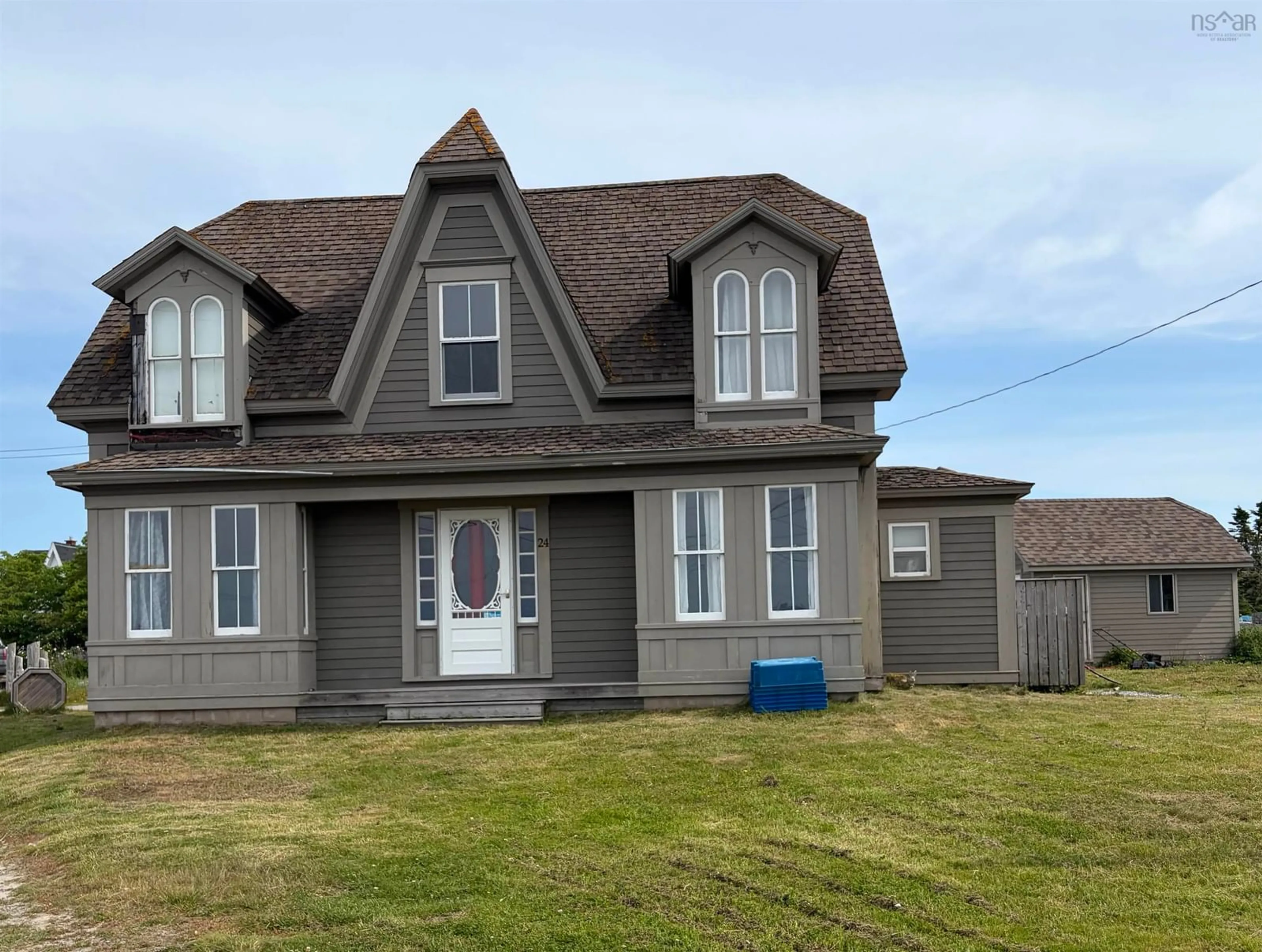 Home with vinyl exterior material, street for 24 School St, Clark's Harbour Nova Scotia B0W 1P0