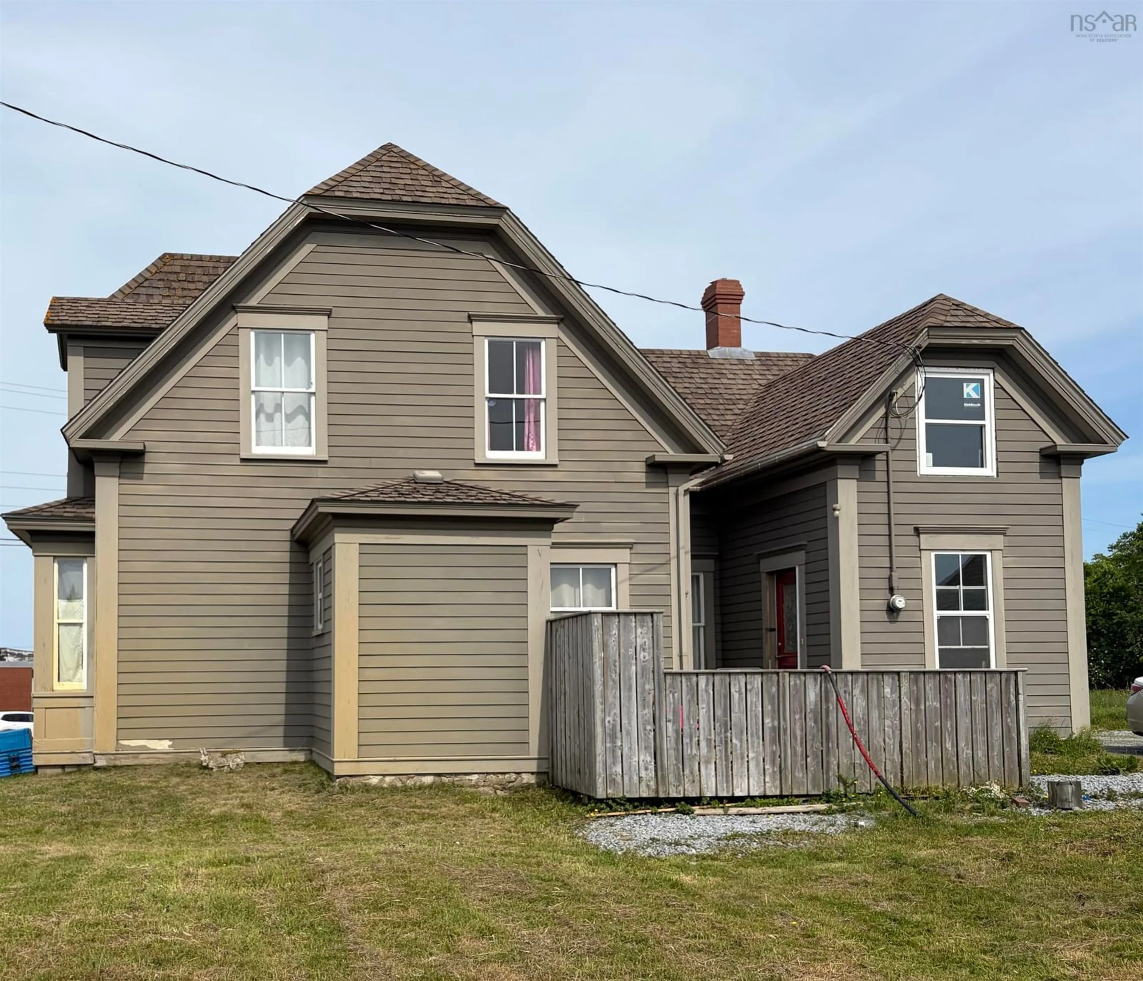 Home with vinyl exterior material, street for 24 School St, Clark's Harbour Nova Scotia B0W 1P0