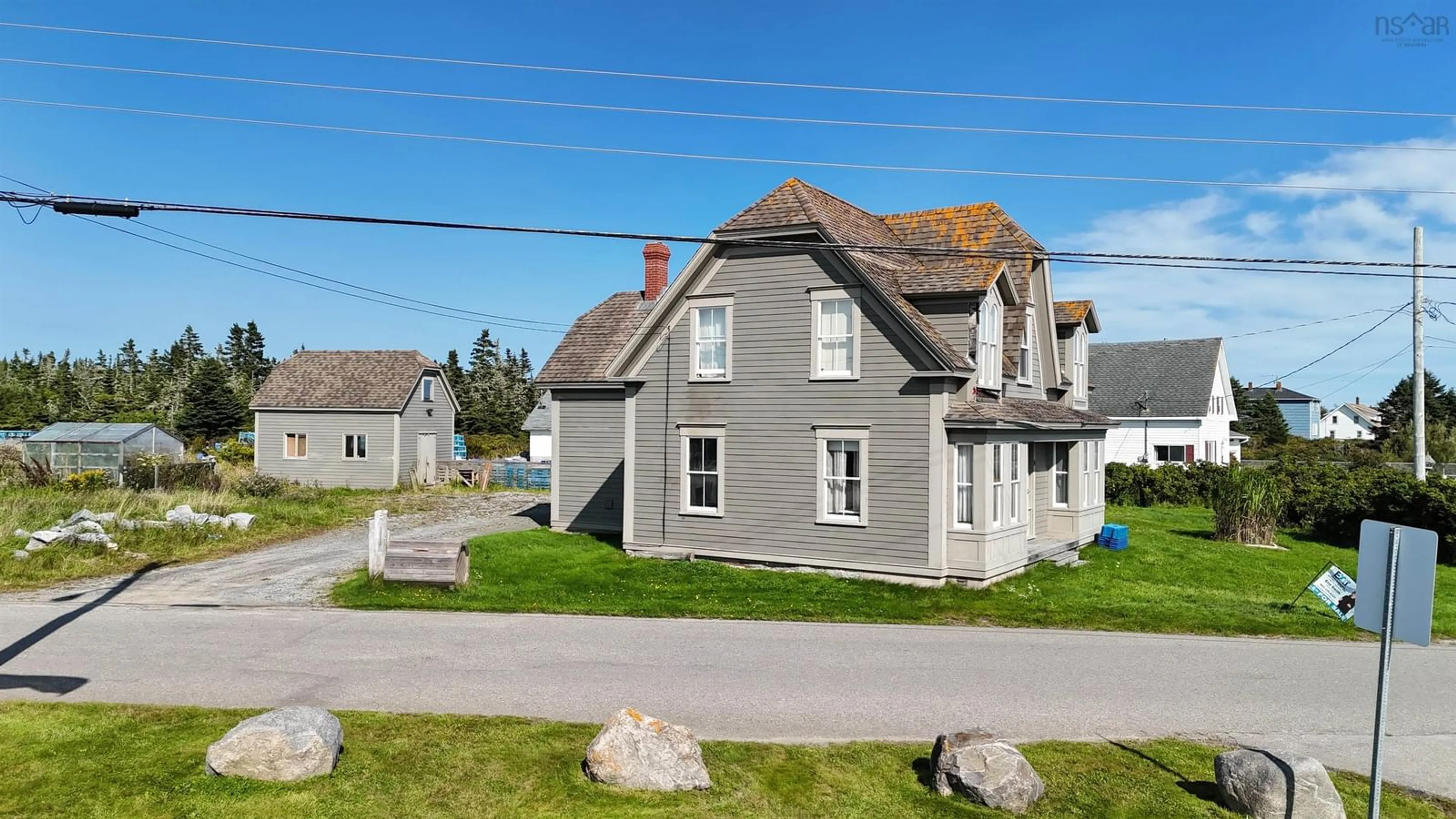 A pic from outside/outdoor area/front of a property/back of a property/a pic from drone, street for 24 School St, Clark's Harbour Nova Scotia B0W 1P0