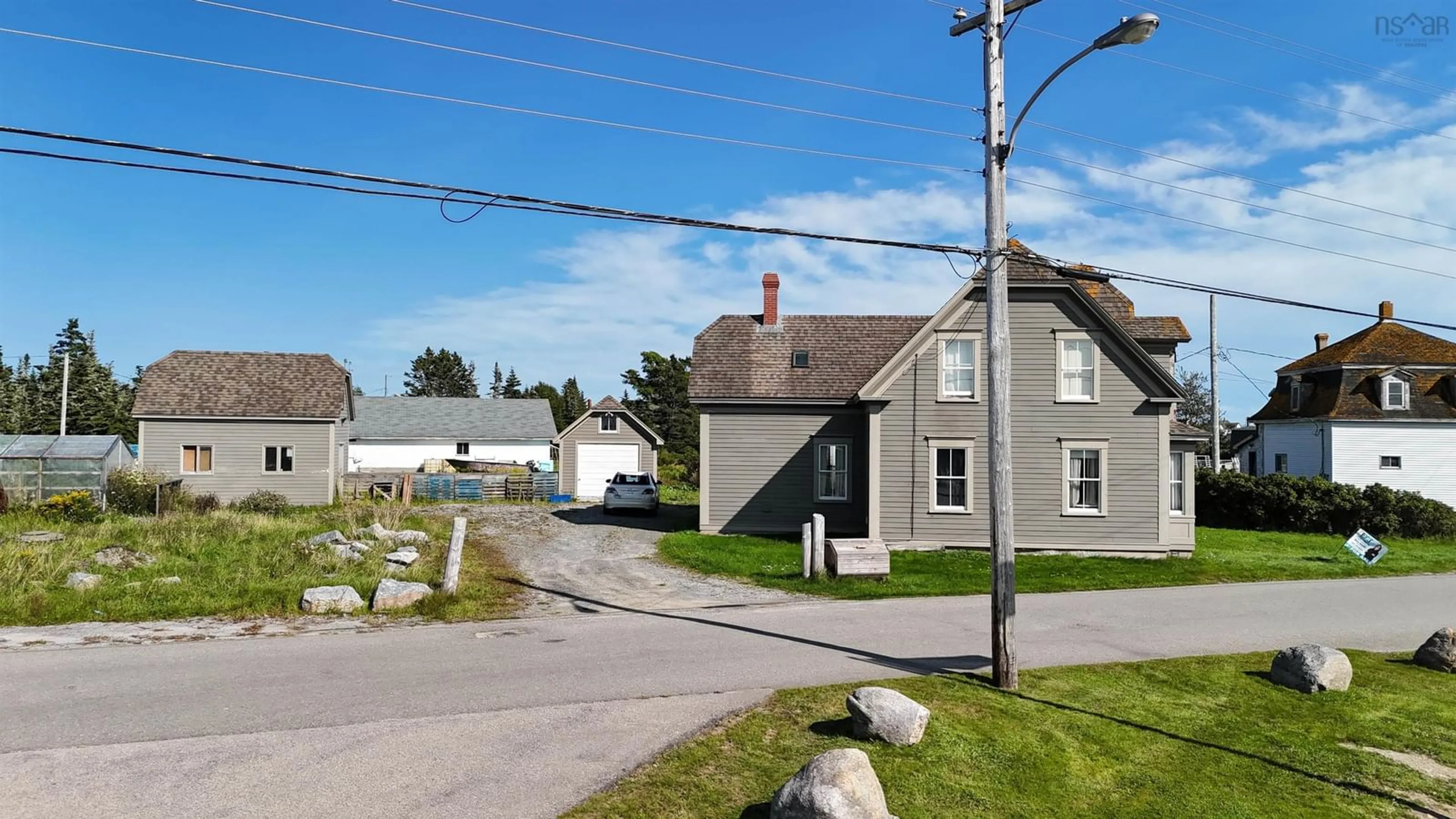 A pic from outside/outdoor area/front of a property/back of a property/a pic from drone, street for 24 School St, Clark's Harbour Nova Scotia B0W 1P0
