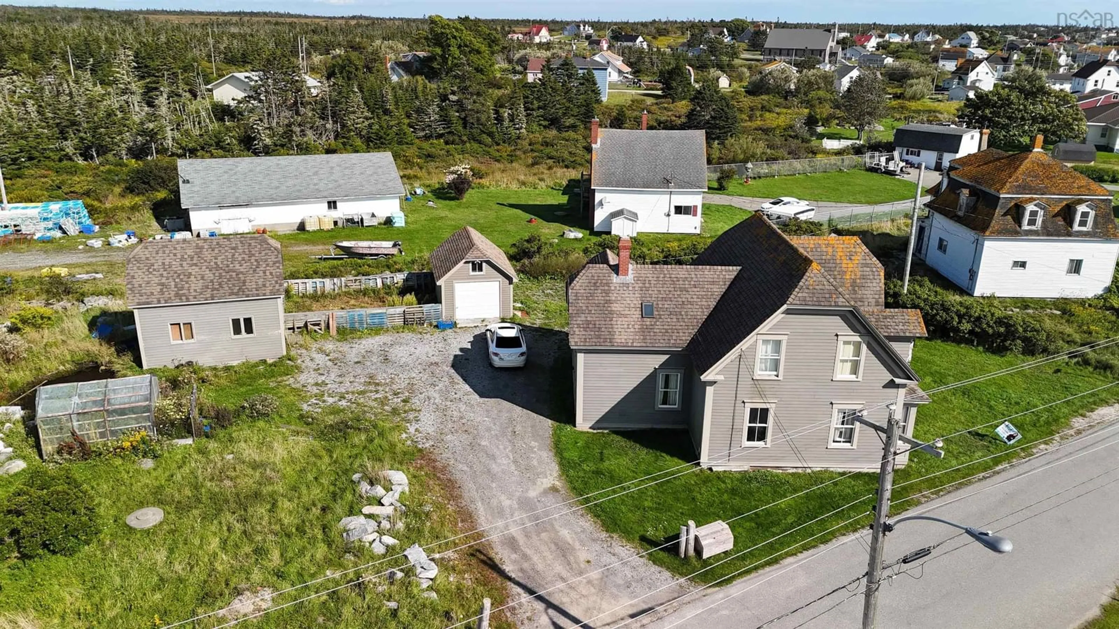 A pic from outside/outdoor area/front of a property/back of a property/a pic from drone, street for 24 School St, Clark's Harbour Nova Scotia B0W 1P0