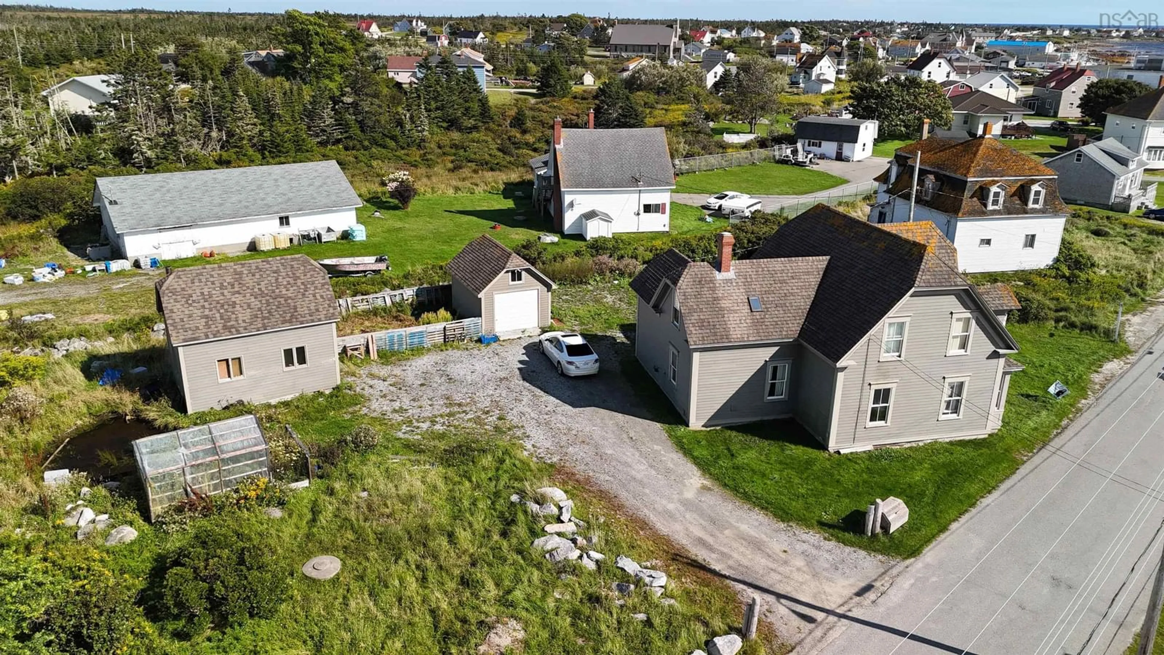 A pic from outside/outdoor area/front of a property/back of a property/a pic from drone, street for 24 School St, Clark's Harbour Nova Scotia B0W 1P0