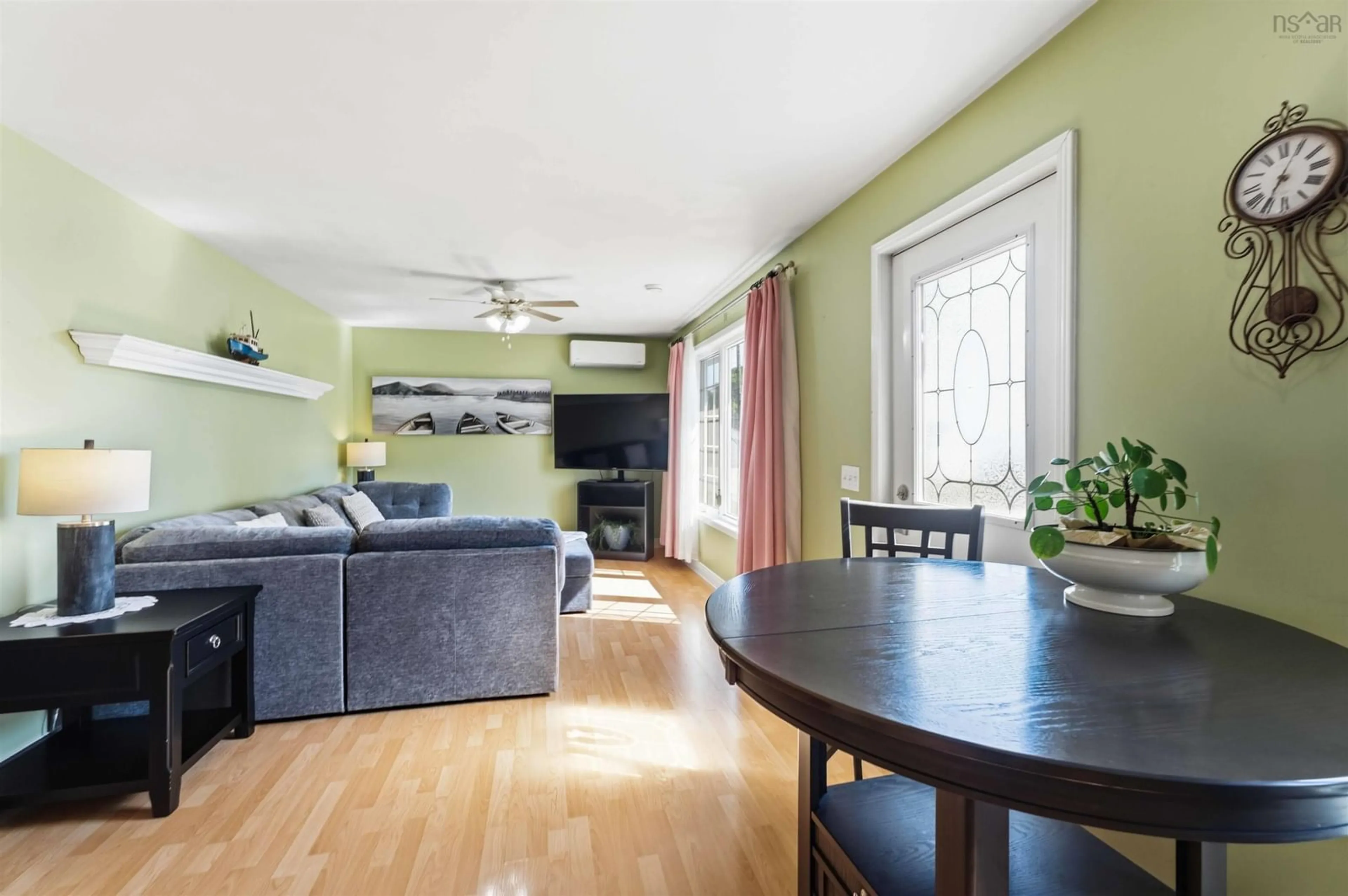 Living room with furniture, wood/laminate floor for 117 First Ave, Digby Nova Scotia B0V 1A0