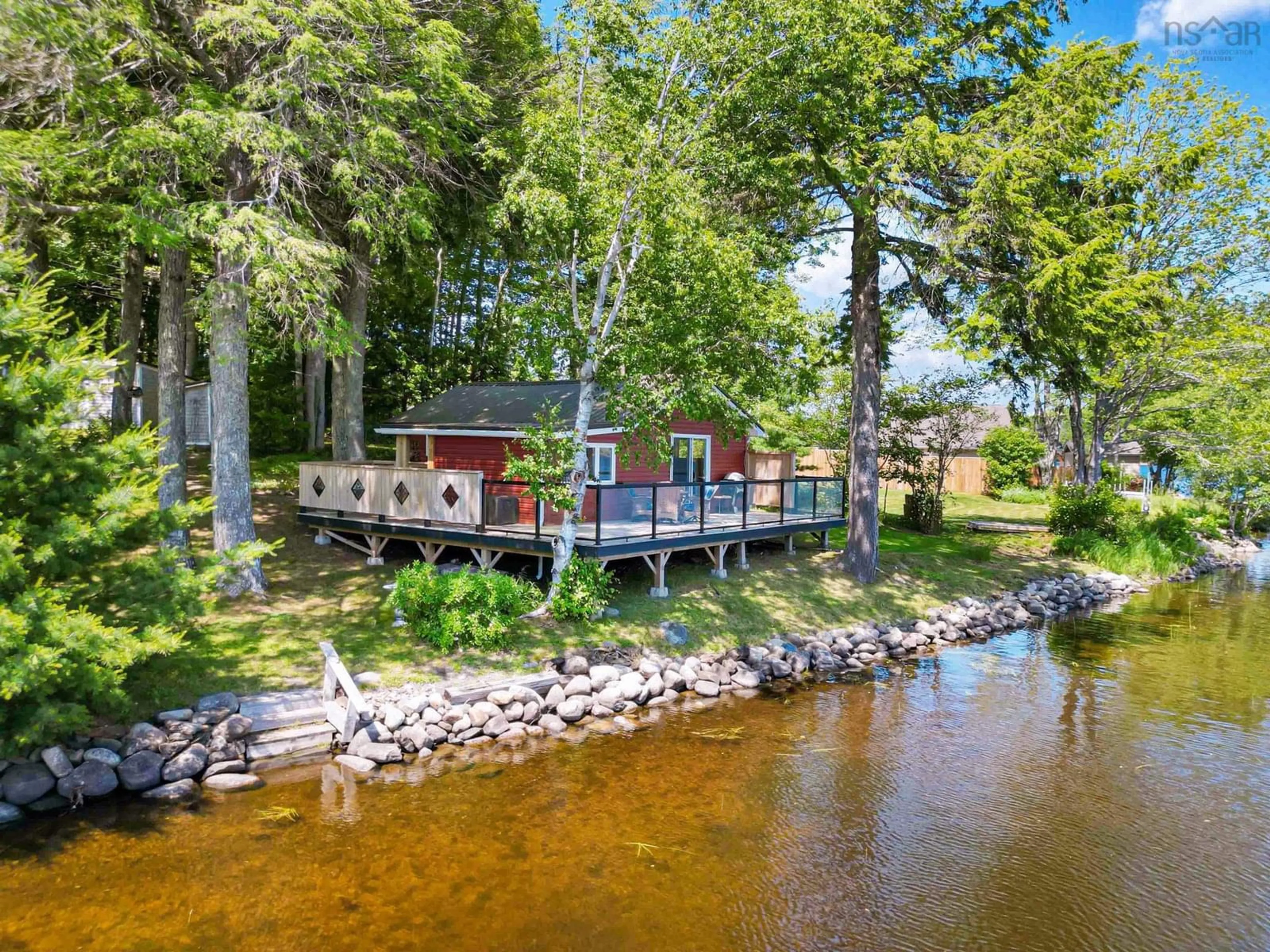 A pic from outside/outdoor area/front of a property/back of a property/a pic from drone, water/lake/river/ocean view for 87 Lake Road Number 4 Rd, Pine Grove Nova Scotia B4V 8E9