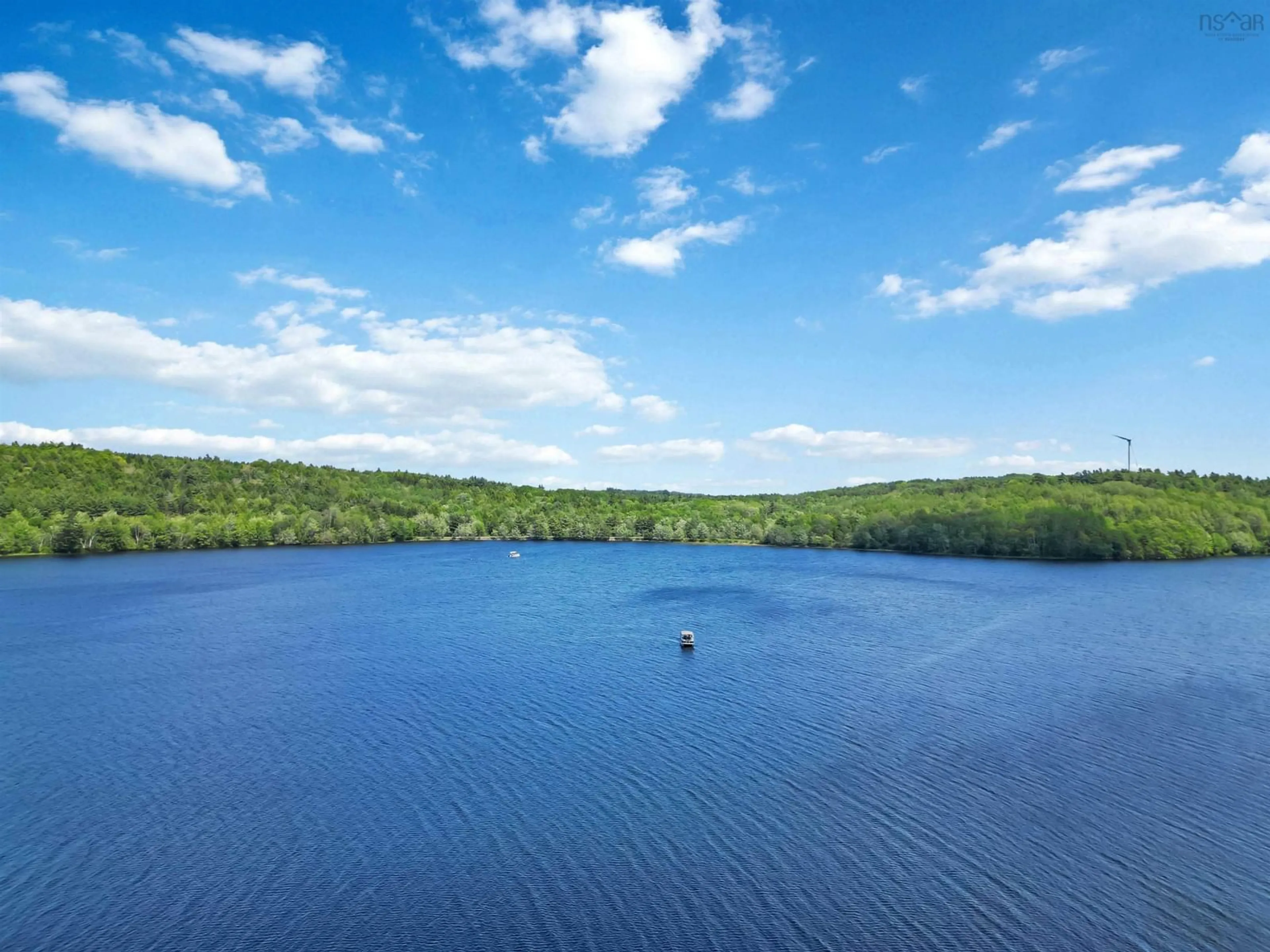 A pic from outside/outdoor area/front of a property/back of a property/a pic from drone, water/lake/river/ocean view for 87 Lake Road Number 4 Rd, Pine Grove Nova Scotia B4V 8E9