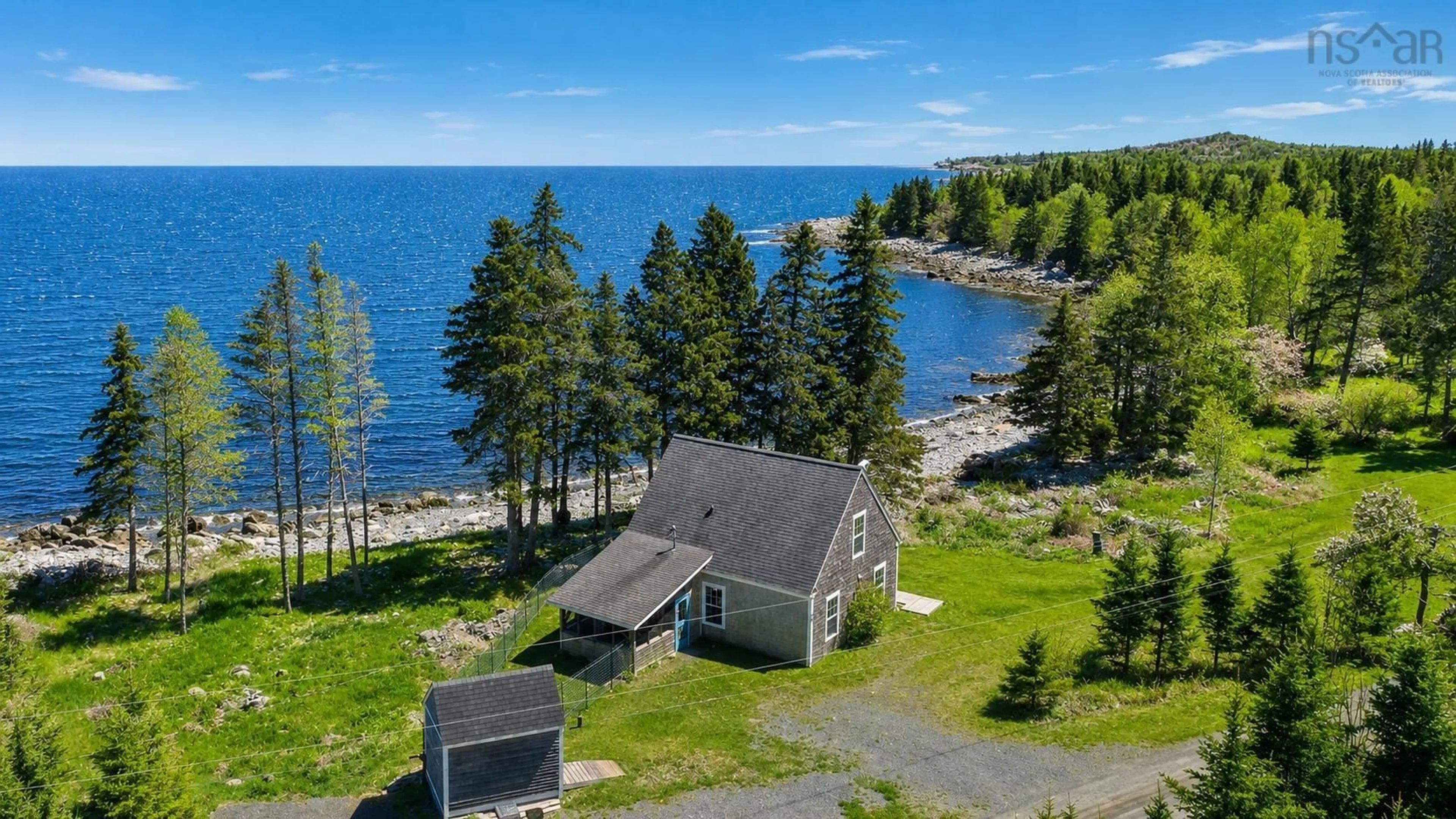 A pic from outside/outdoor area/front of a property/back of a property/a pic from drone, water/lake/river/ocean view for 569 Long Cove Rd, Port Medway Nova Scotia B0J 2T0