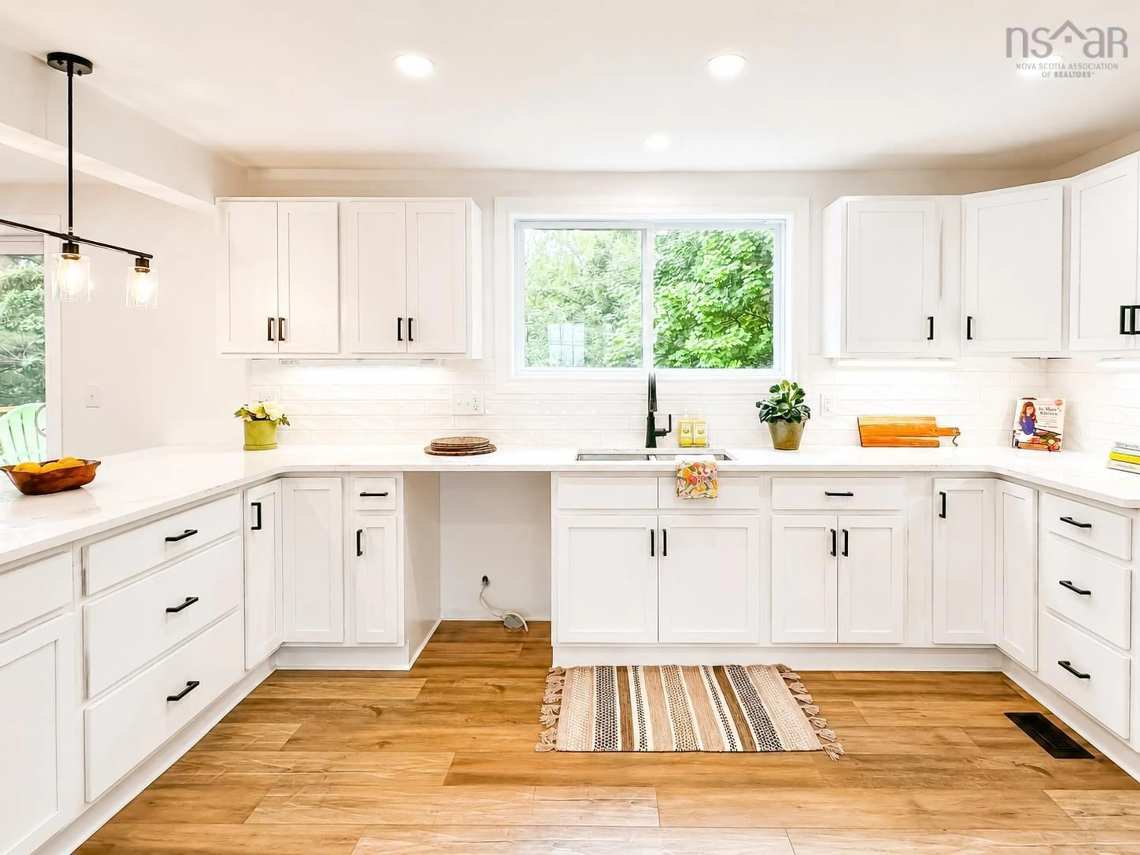 Open concept kitchen, wood/laminate floor for 2617 Pereau Rd, White Water Nova Scotia B0P 1H0