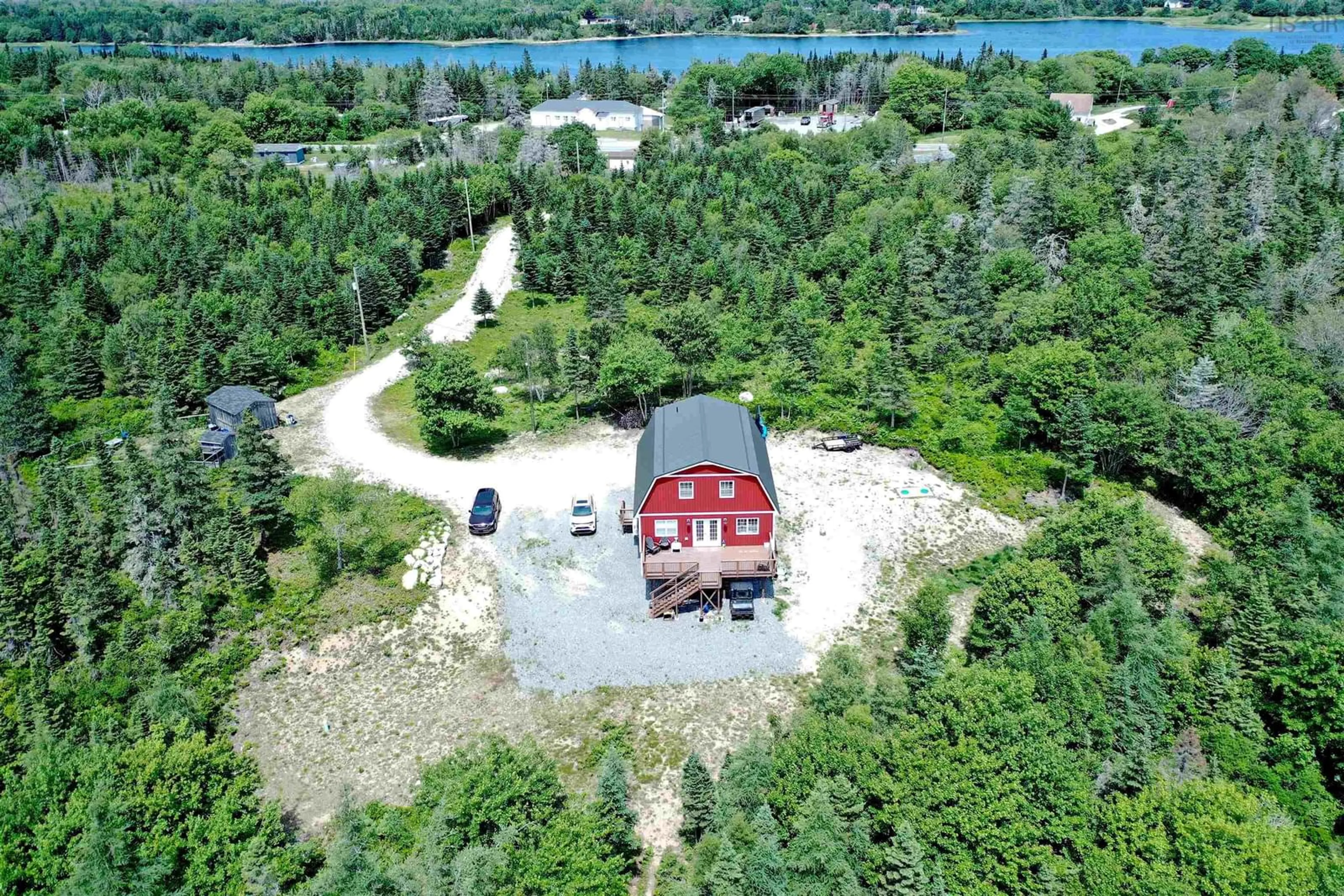 A pic from outside/outdoor area/front of a property/back of a property/a pic from drone, water/lake/river/ocean view for 302 Port Latour Rd, Port Clyde Nova Scotia B0W 2S0
