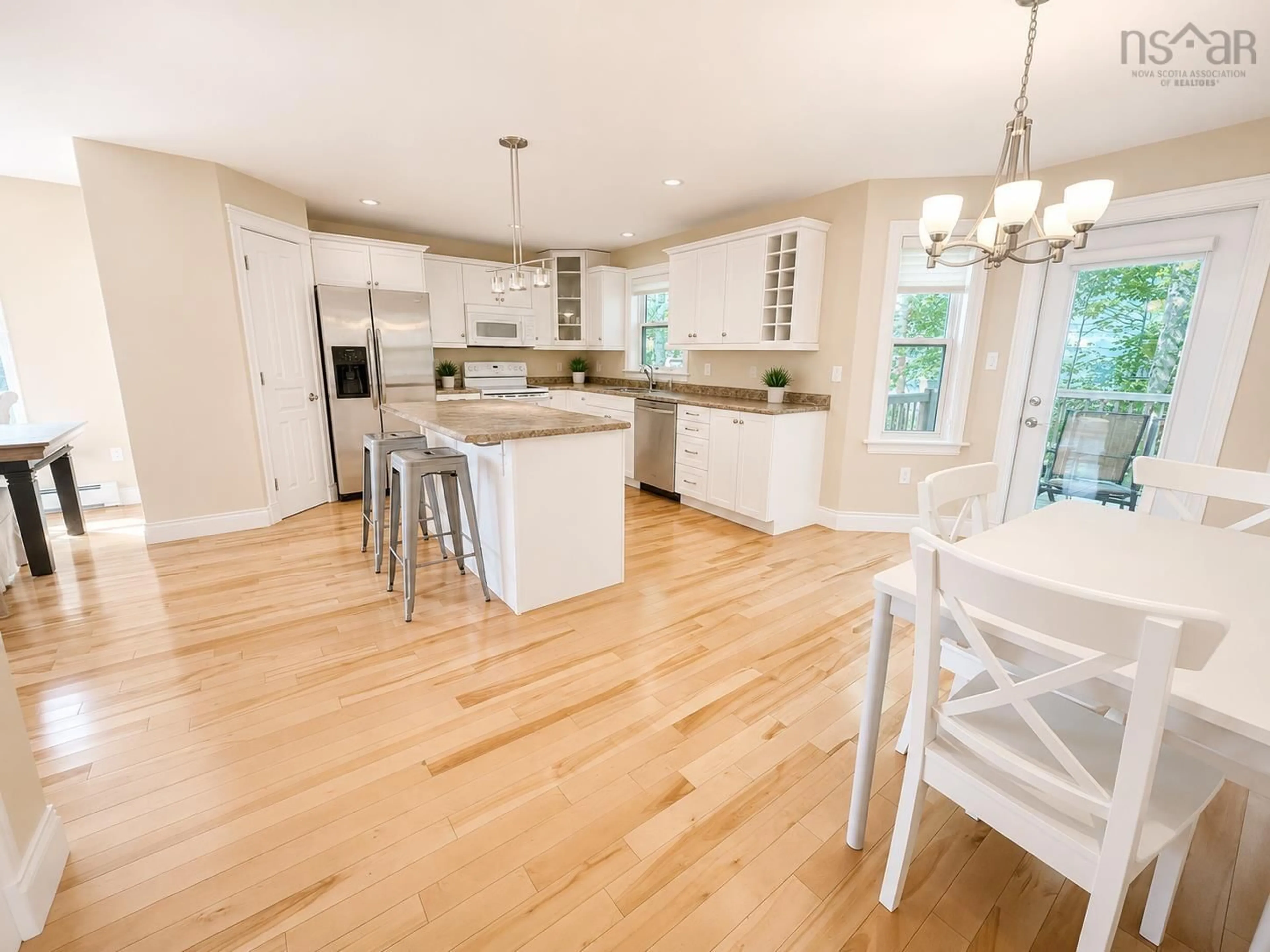 Open concept kitchen, wood/laminate floor for 31 Sagewood Lane, Halifax Nova Scotia B3P 0B8