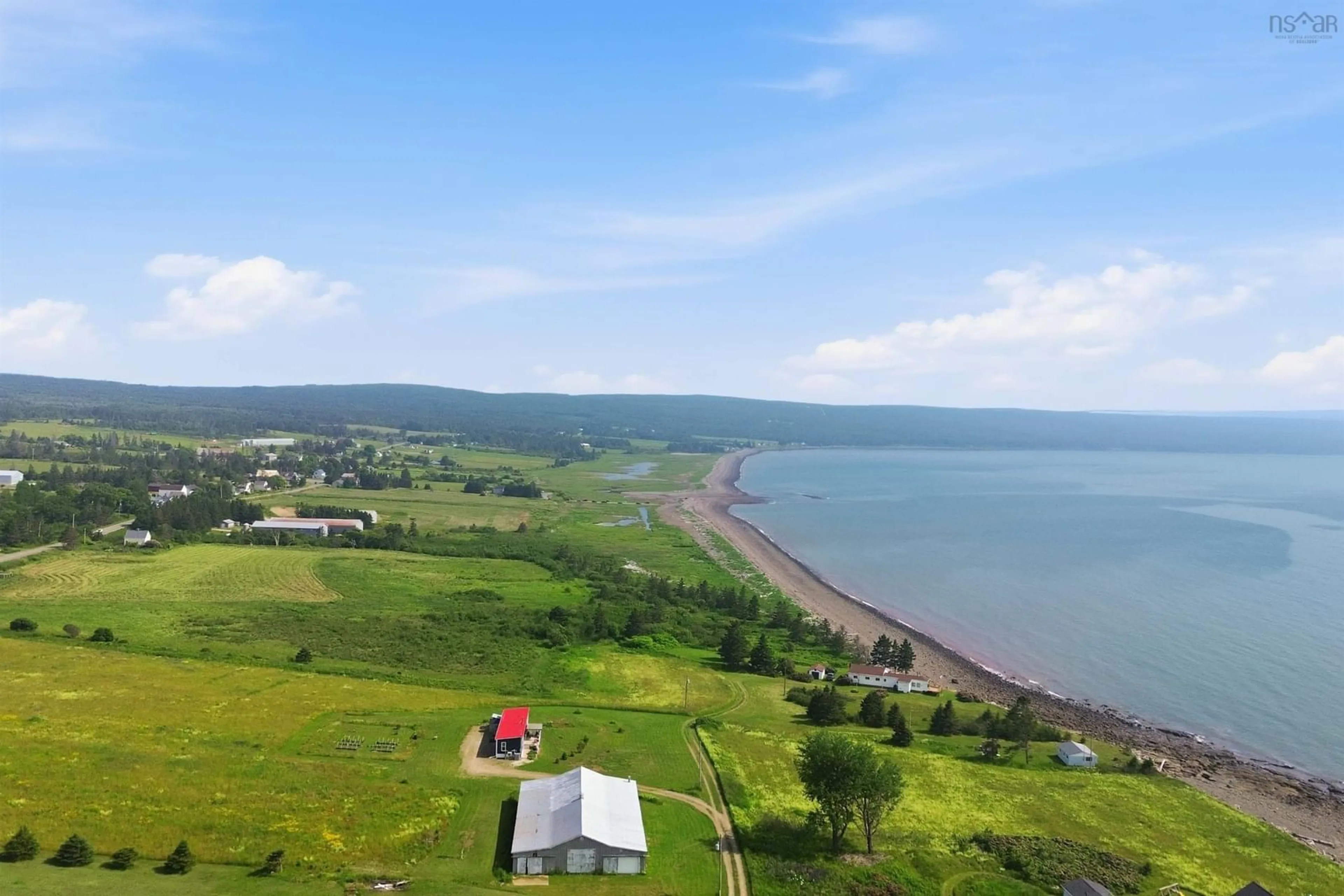 A pic from outside/outdoor area/front of a property/back of a property/a pic from drone, water/lake/river/ocean view for 1474 Cape Split Rd, Scots Bay Nova Scotia B0P 1H0
