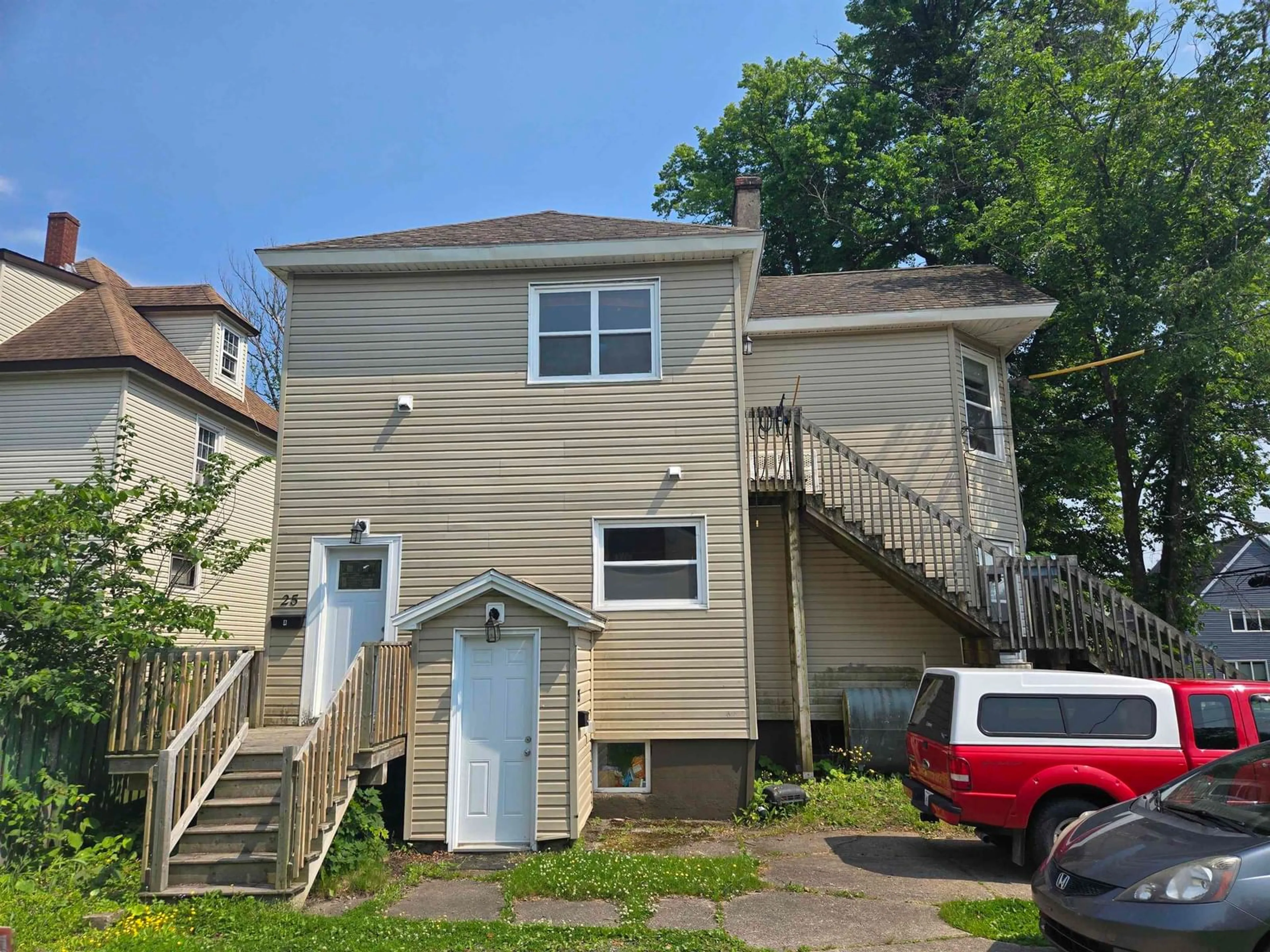 A pic from outside/outdoor area/front of a property/back of a property/a pic from drone, street for 149 Whitney Ave, Sydney Nova Scotia B1P 5A1