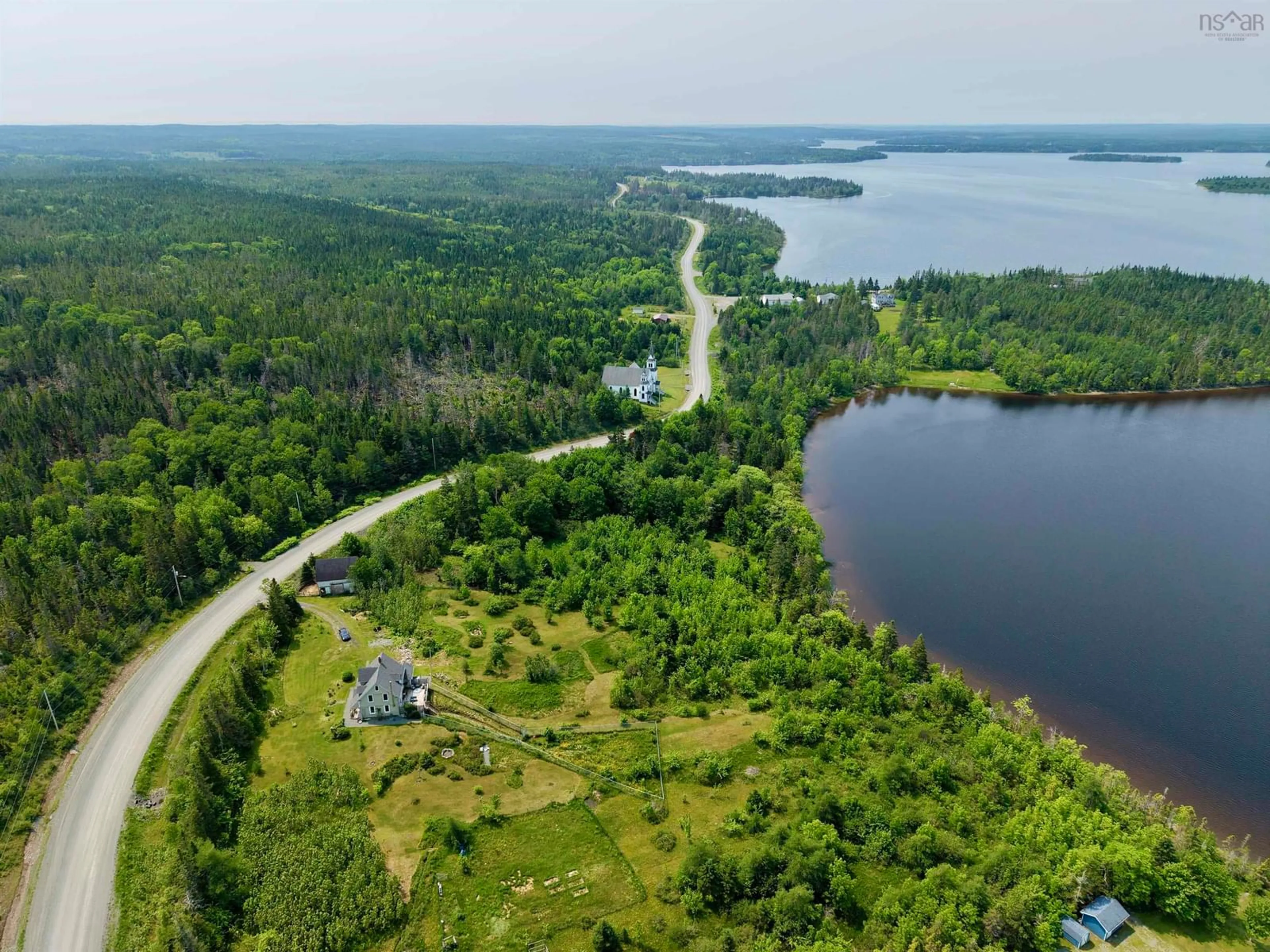 A pic from outside/outdoor area/front of a property/back of a property/a pic from drone, water/lake/river/ocean view for 3463 Loch Lomond Rd., Loch Lomond Nova Scotia B2E 1C5