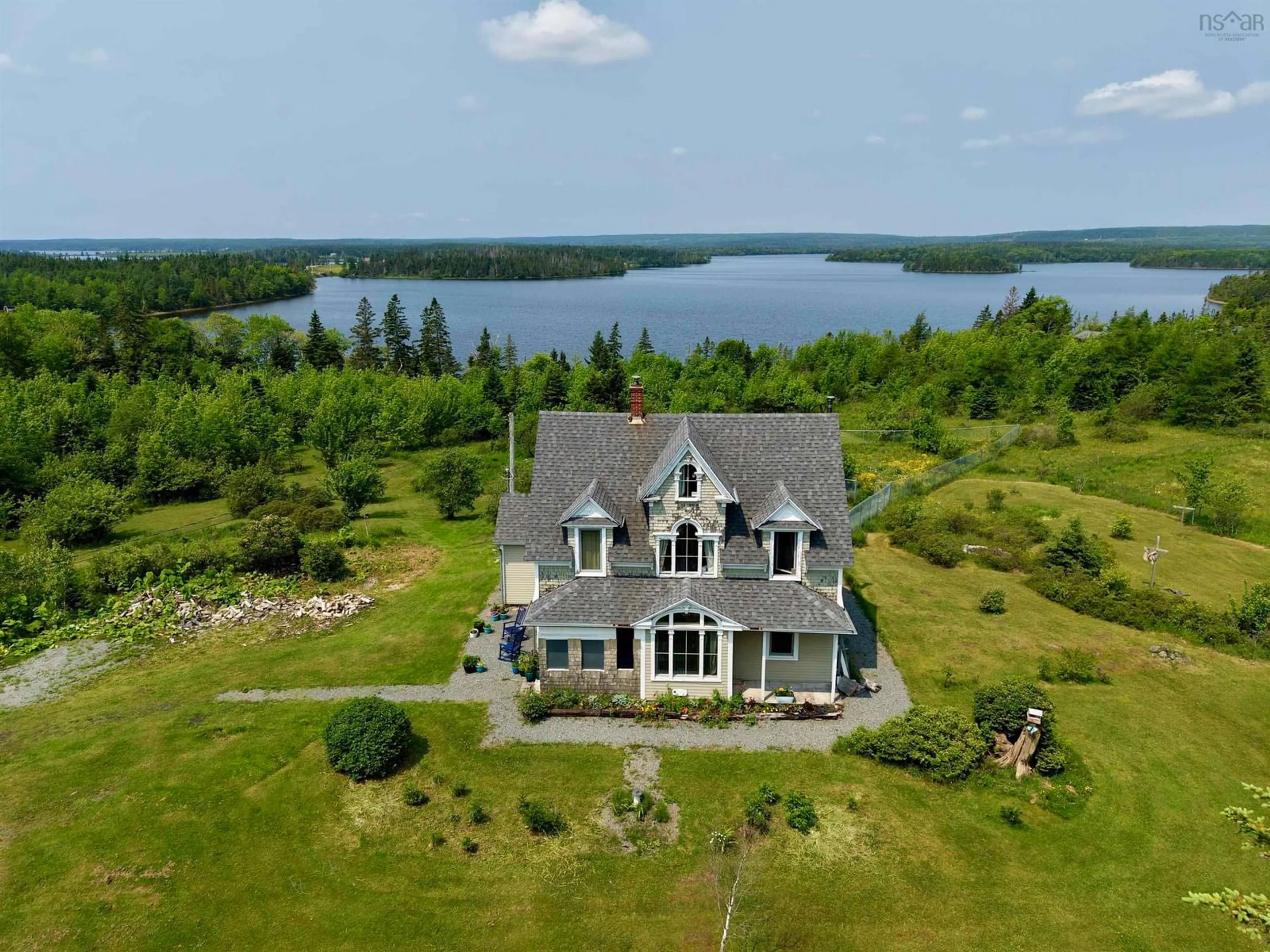 A pic from outside/outdoor area/front of a property/back of a property/a pic from drone, water/lake/river/ocean view for 3463 Loch Lomond Rd., Loch Lomond Nova Scotia B2E 1C5