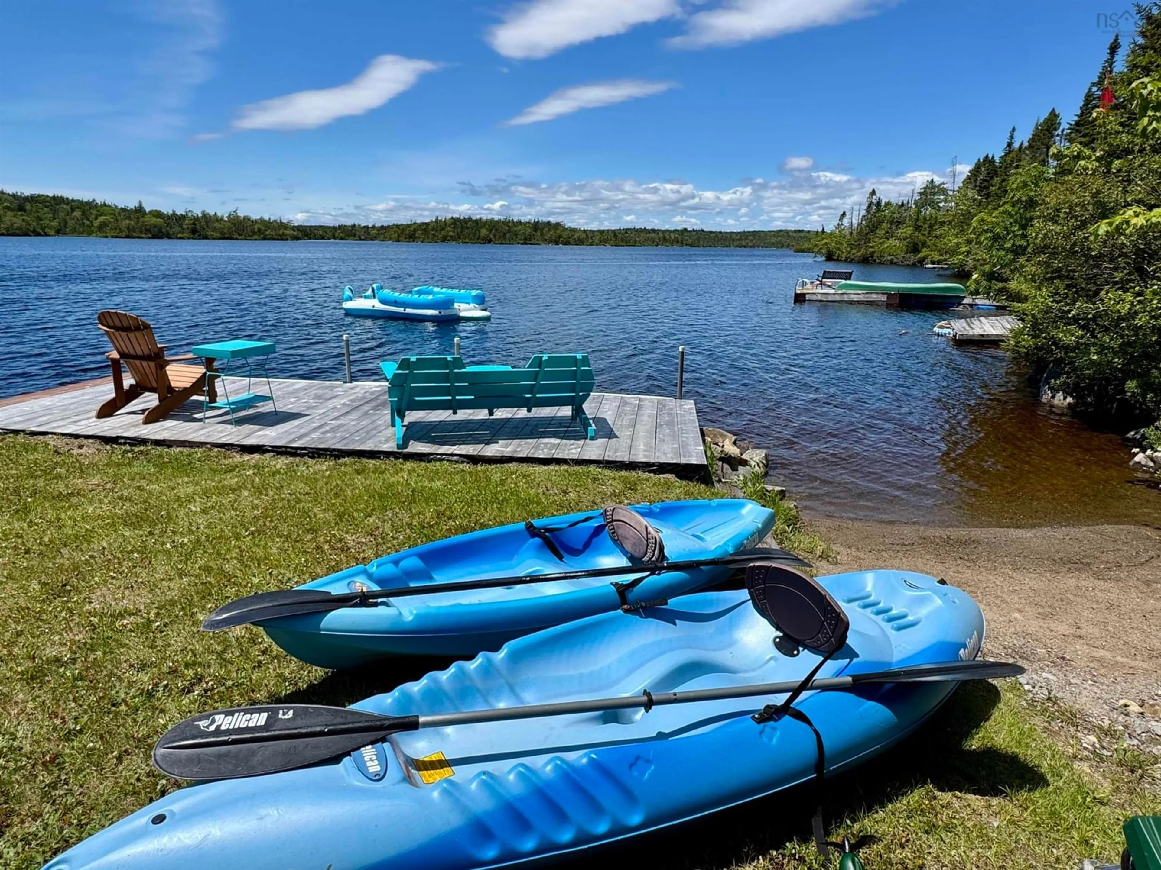 A pic from outside/outdoor area/front of a property/back of a property/a pic from drone, water/lake/river/ocean view for 1061 Mooseland Rd, Third Lake Nova Scotia B0J 3H0