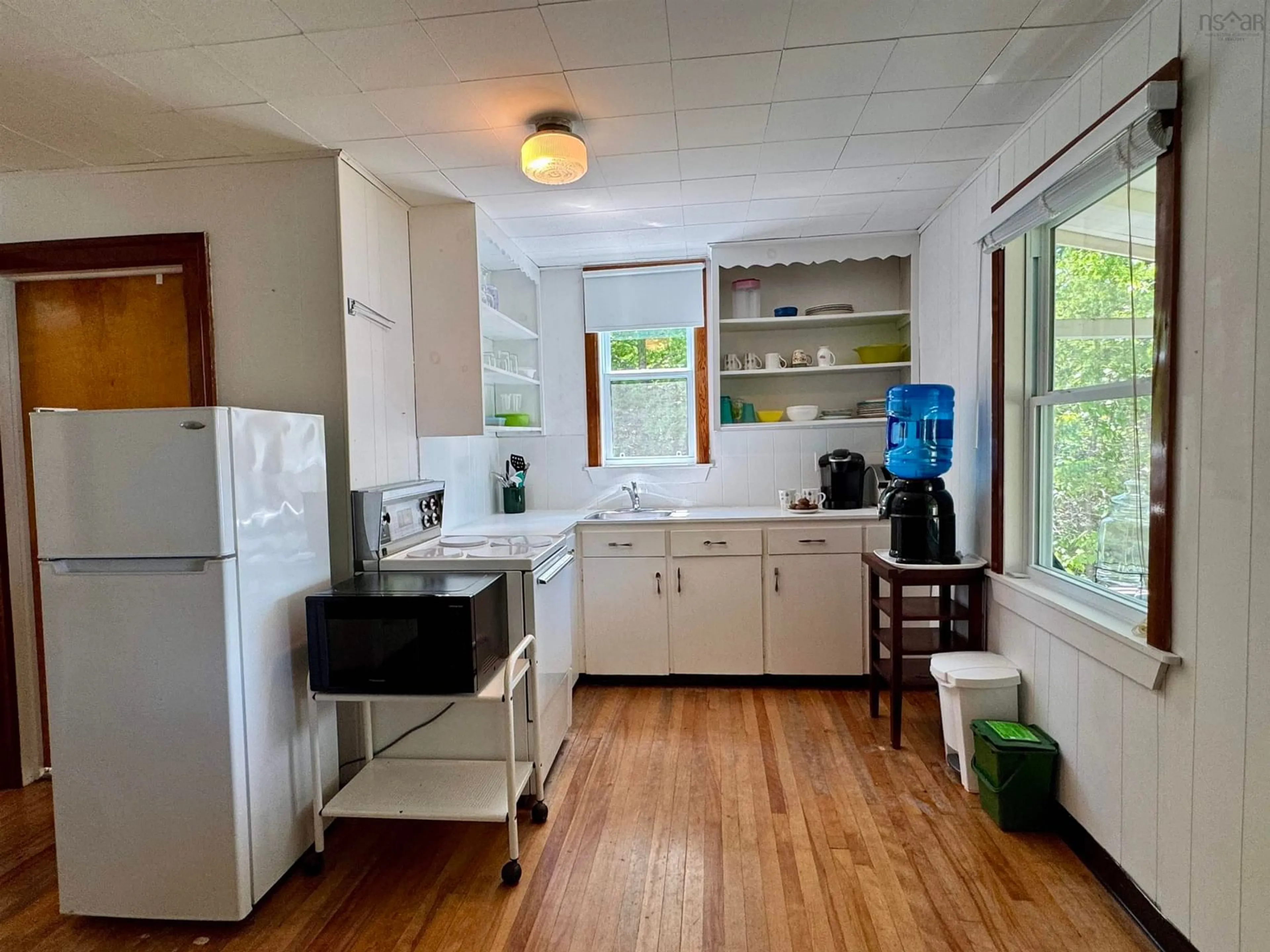 Standard kitchen, wood/laminate floor for 1061 Mooseland Rd, Third Lake Nova Scotia B0J 3H0