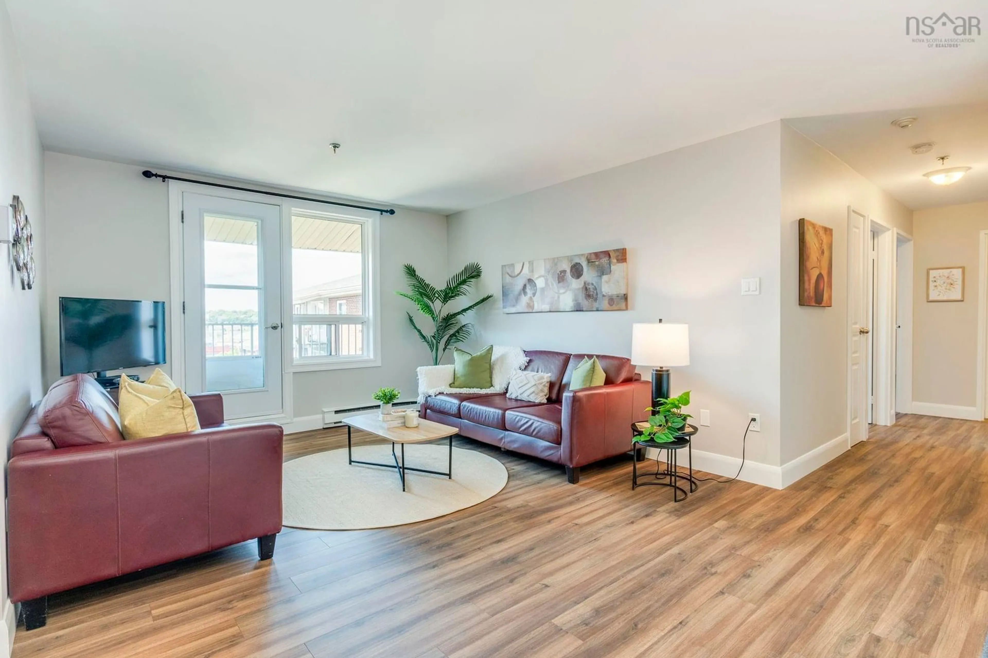 Living room with furniture, wood/laminate floor for 281 Windmill Rd #474, Dartmouth Nova Scotia B3A 4P9