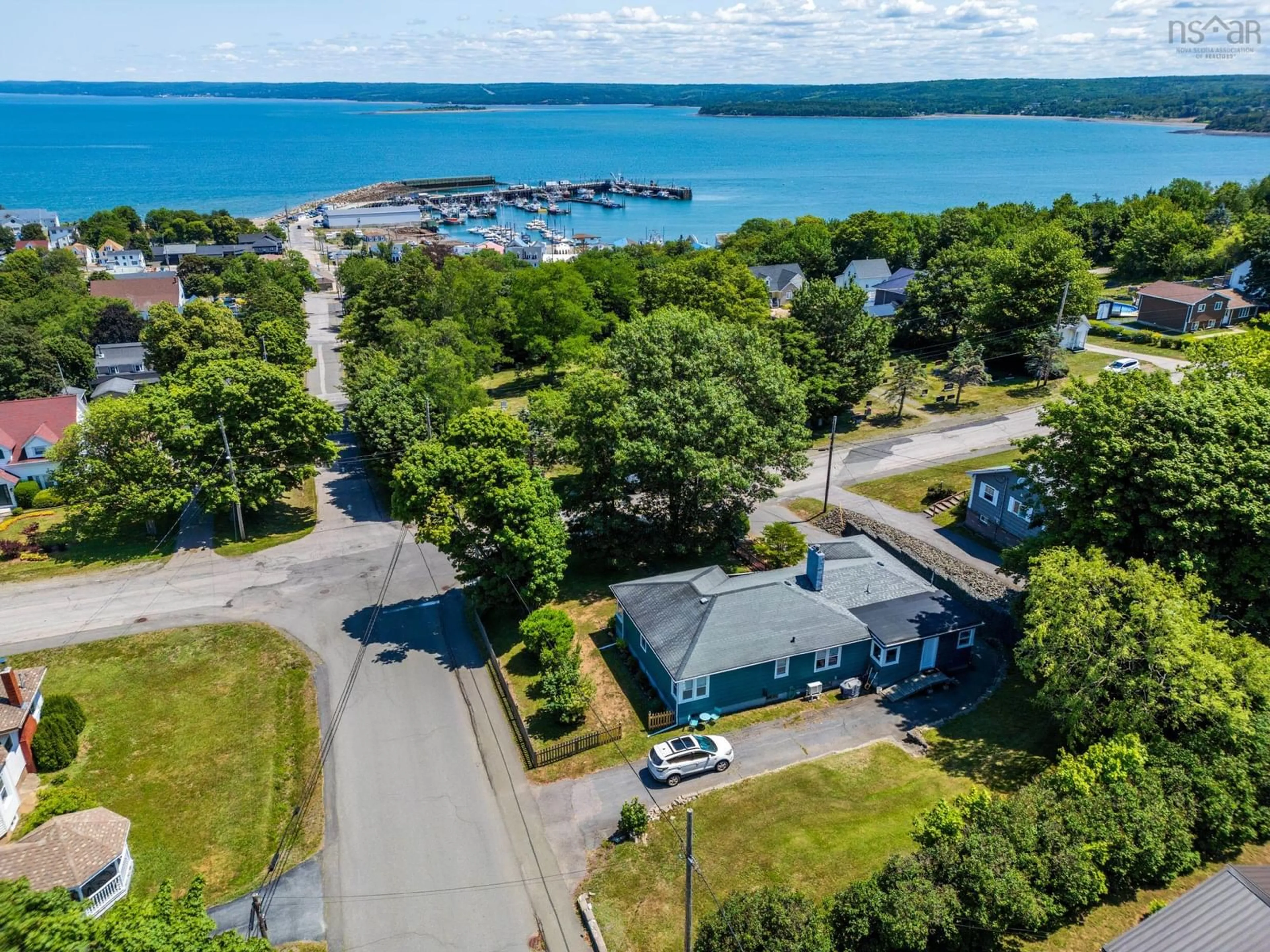 A pic from outside/outdoor area/front of a property/back of a property/a pic from drone, water/lake/river/ocean view for 173 King Street, Digby Nova Scotia B0V 1A0
