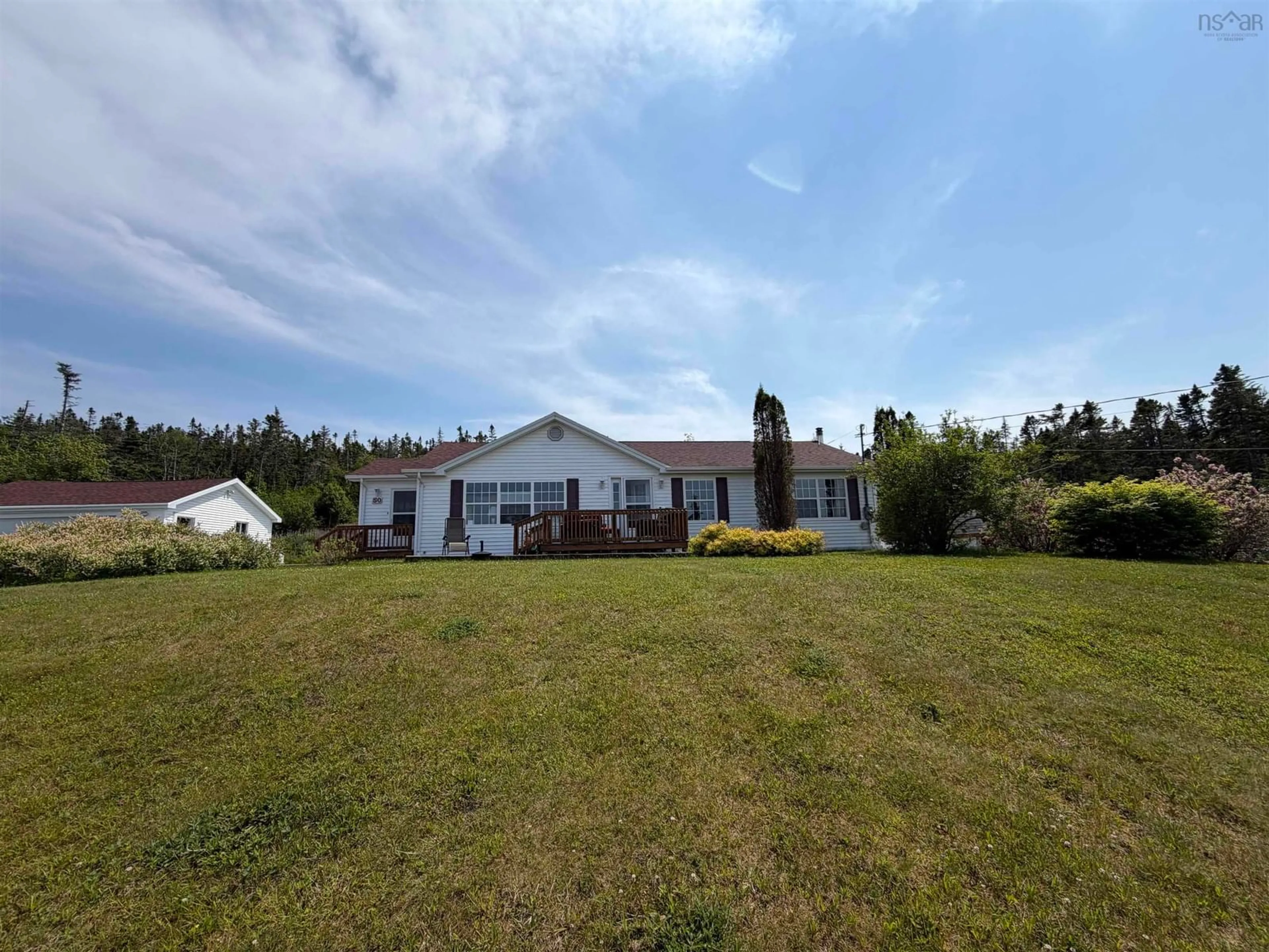 A pic from outside/outdoor area/front of a property/back of a property/a pic from drone, mountain view for 50 Ocean Dr, Mushaboom Nova Scotia B0J 3H0