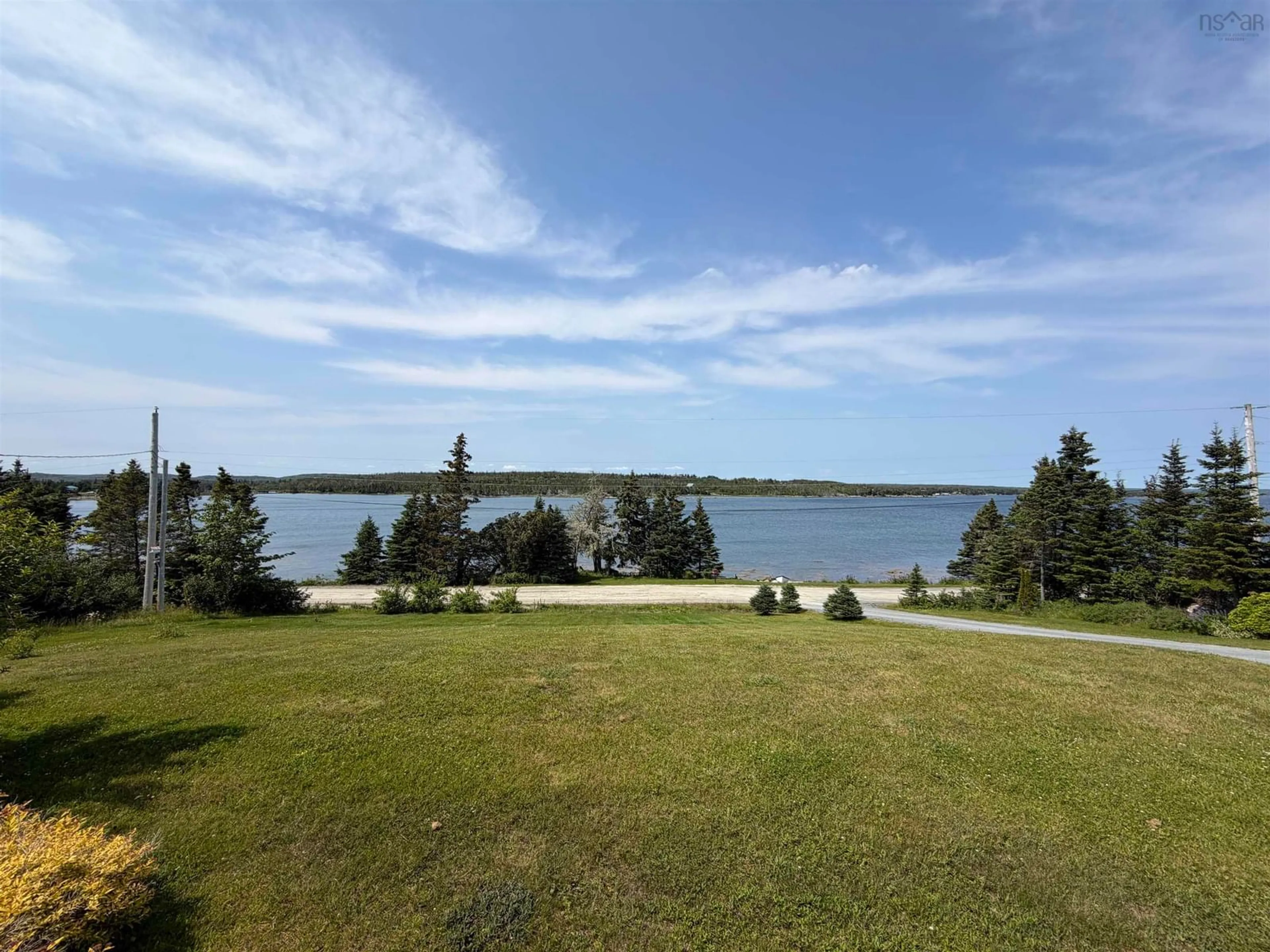 A pic from outside/outdoor area/front of a property/back of a property/a pic from drone, water/lake/river/ocean view for 50 Ocean Dr, Mushaboom Nova Scotia B0J 3H0