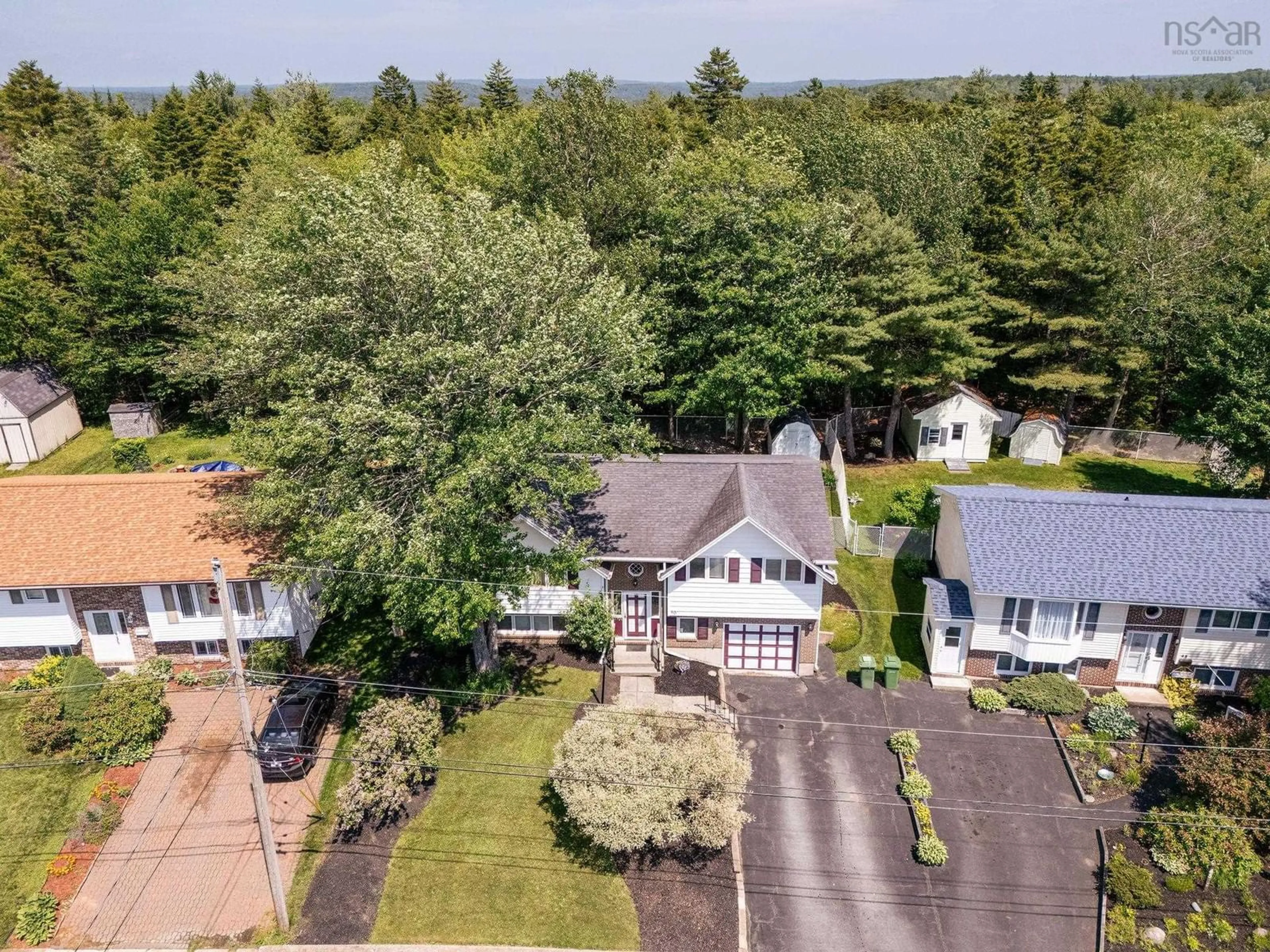 A pic from outside/outdoor area/front of a property/back of a property/a pic from drone, street for 49 Cartier Cres, Lower Sackville Nova Scotia B4C 3K8