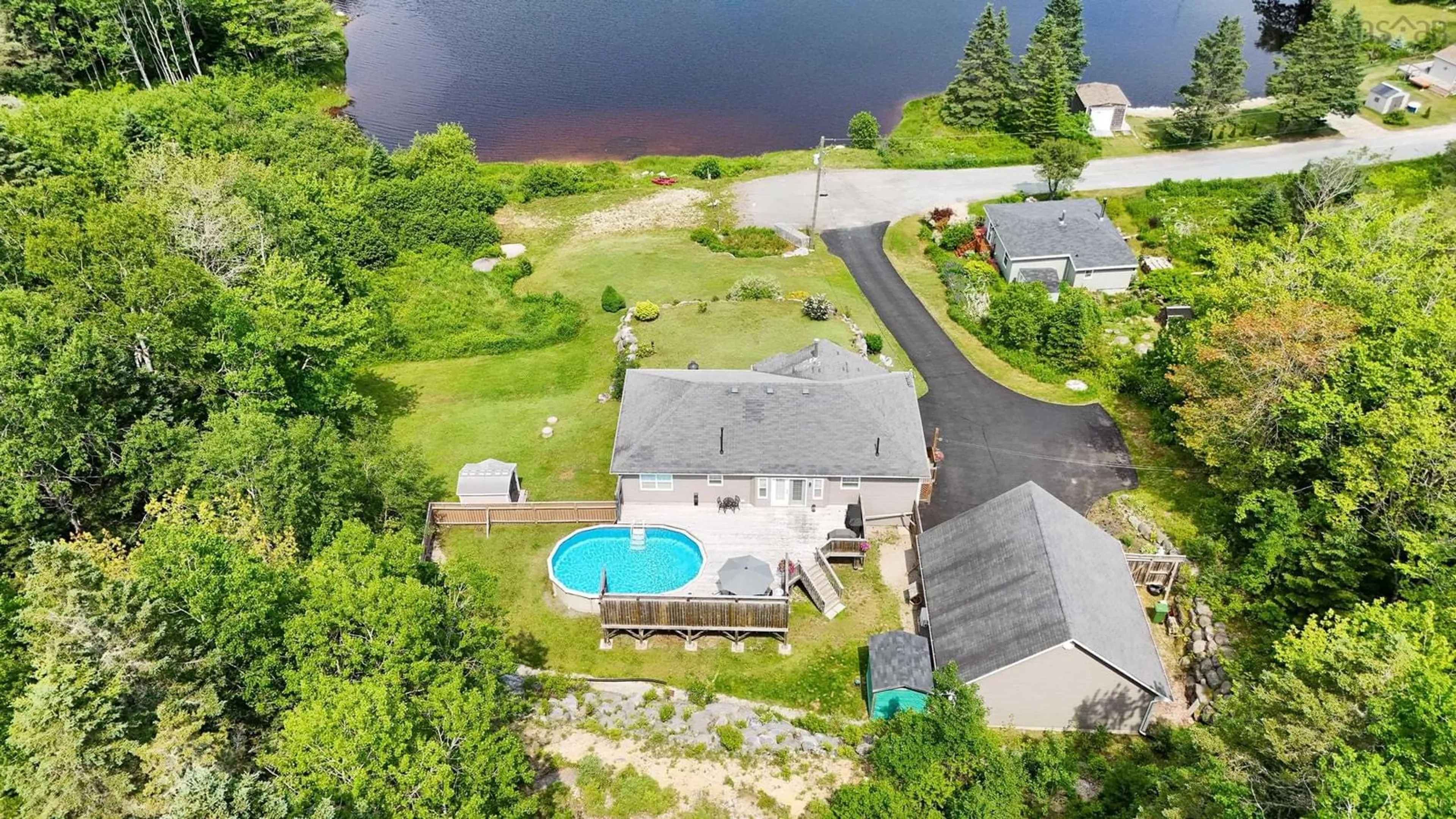 A pic from outside/outdoor area/front of a property/back of a property/a pic from drone, water/lake/river/ocean view for 212 Puddle Rd, Queensland Nova Scotia B0J 1T0