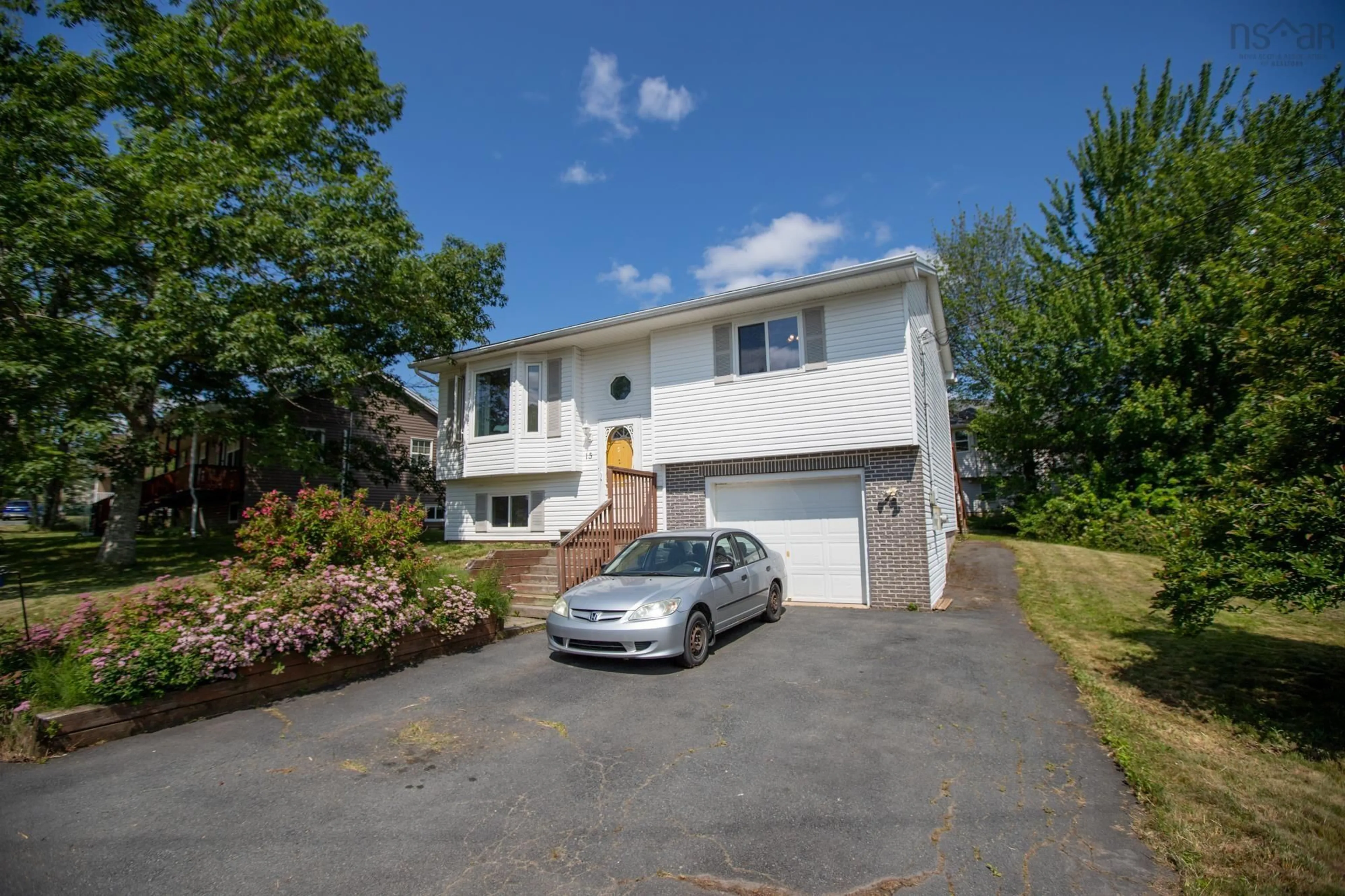 Home with vinyl exterior material, street for 15 Daun Ave, Enfield Nova Scotia B2T 1J7