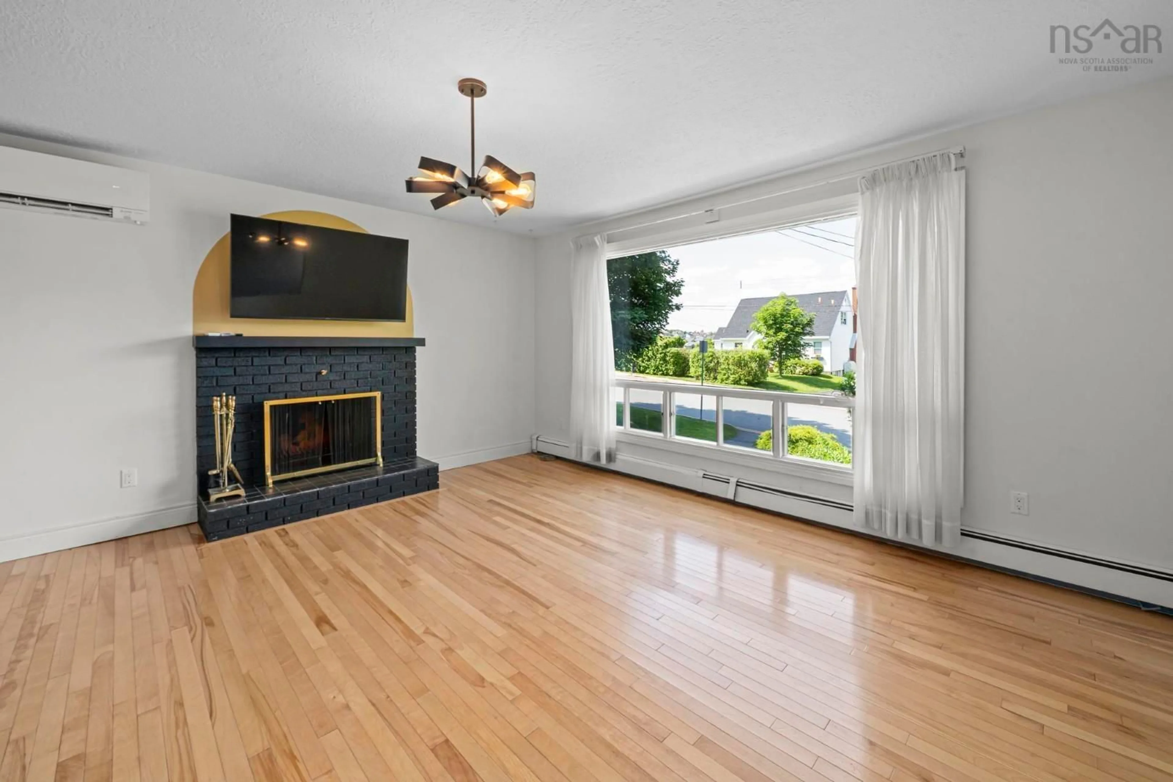 Living room with furniture, wood/laminate floor for 36 Stonehaven Rd, Halifax Nova Scotia B3N 1G3